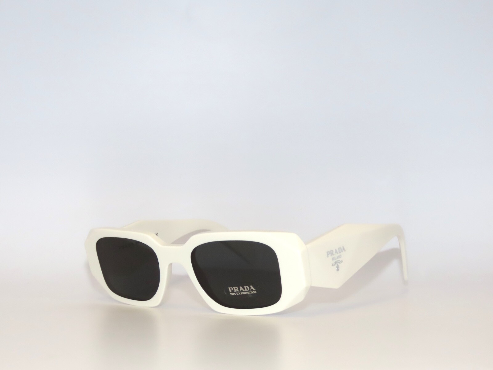Prada SPR17WS 17 1425S0 Talc Dark Gray Sunglasses 17W