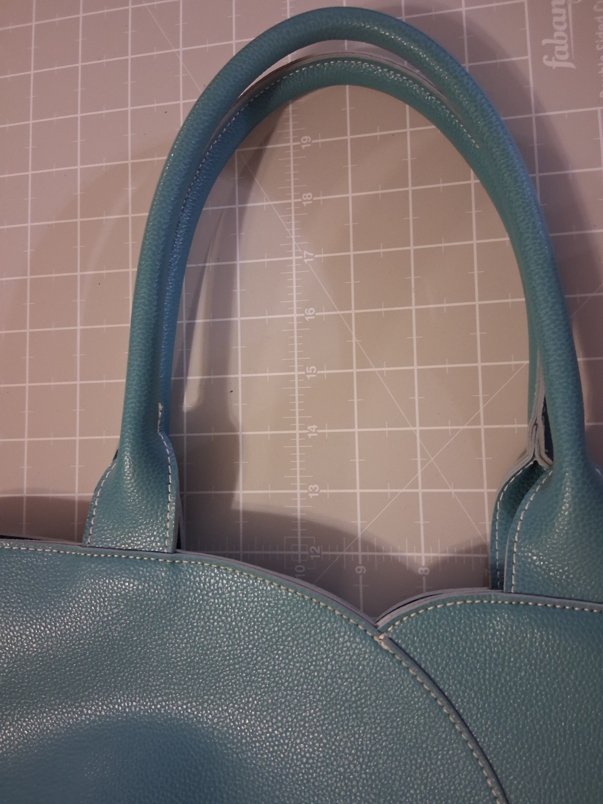 Mellow World tote grained vegan leather tulip curved front panel vibrant teal