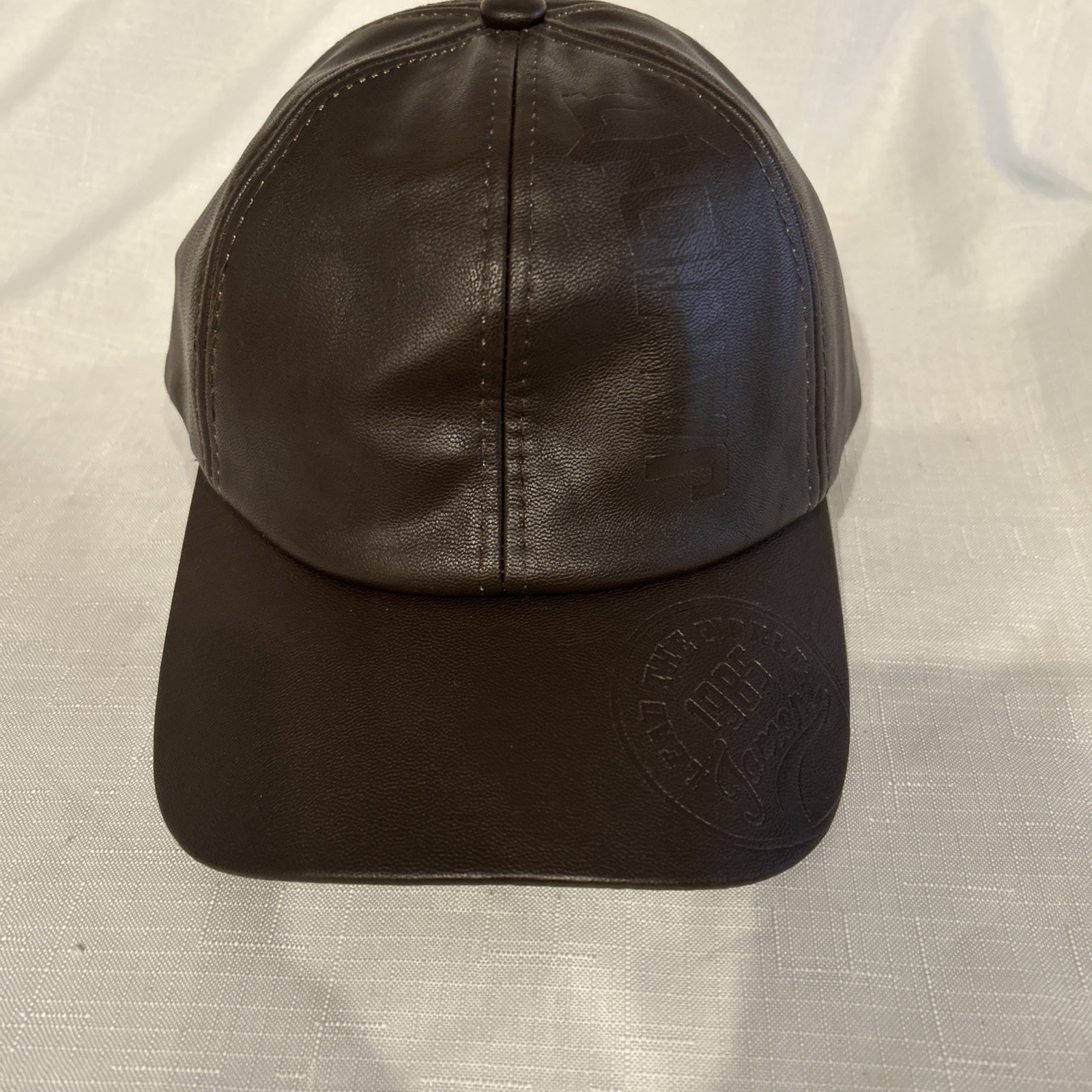 Stylish dark brown eco-leather baseball cap