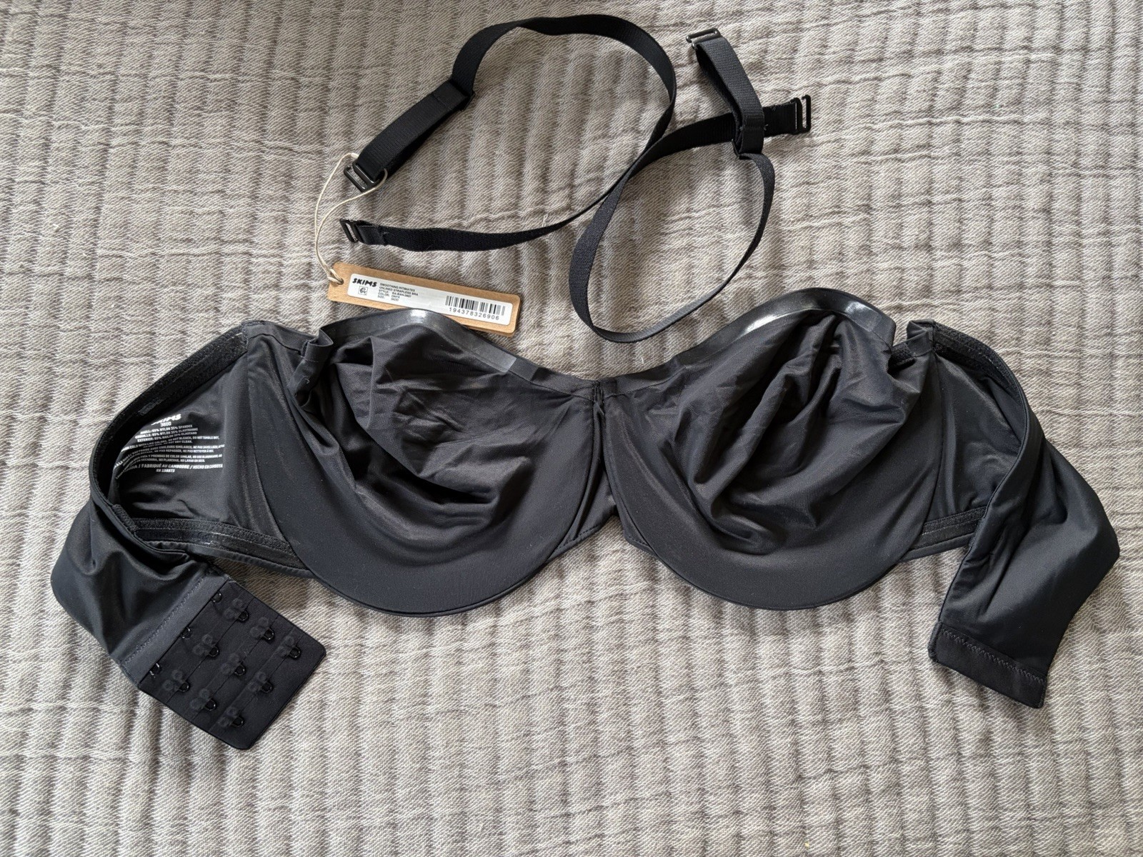 NWT~SKIMS SMOOTHING UNLINED STRAPLESS BRA~ONYX BLACK~SIZE 36DD~BA-BAN-2607