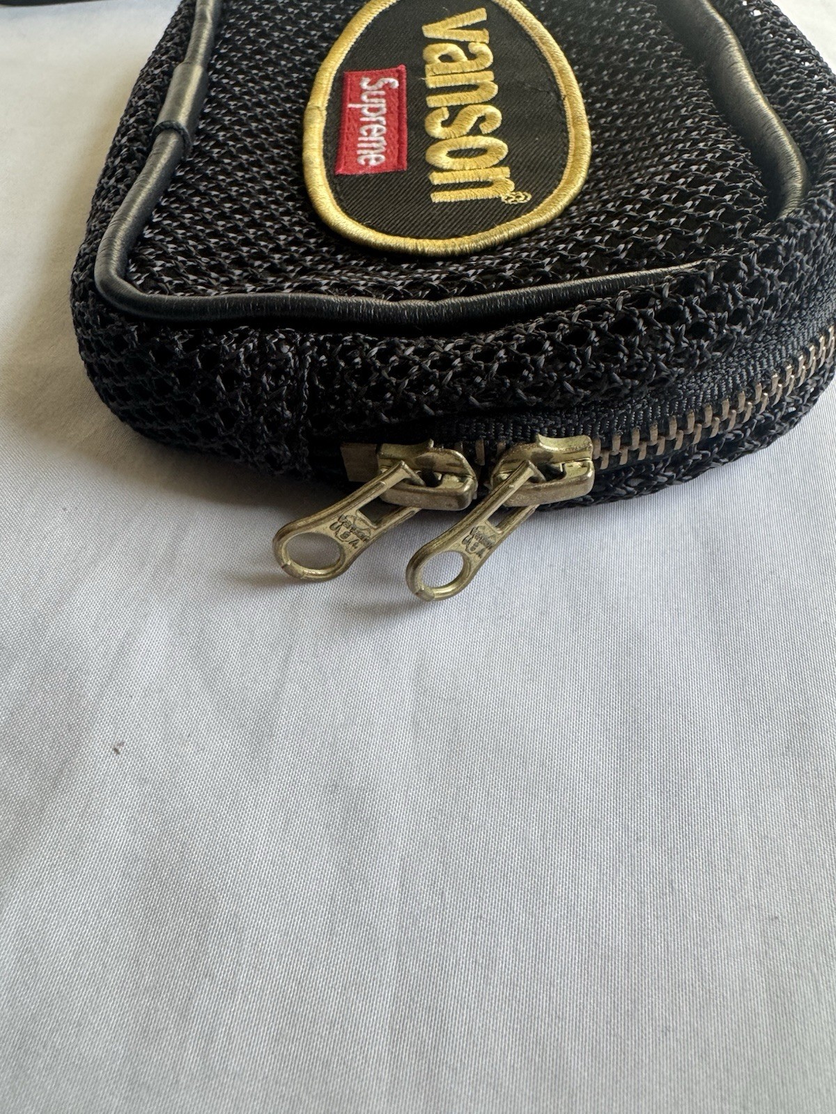 Supreme x Vanson Cow Leather Bl. Zip Wrist Strap Clutch P. Lined Brass, Initials