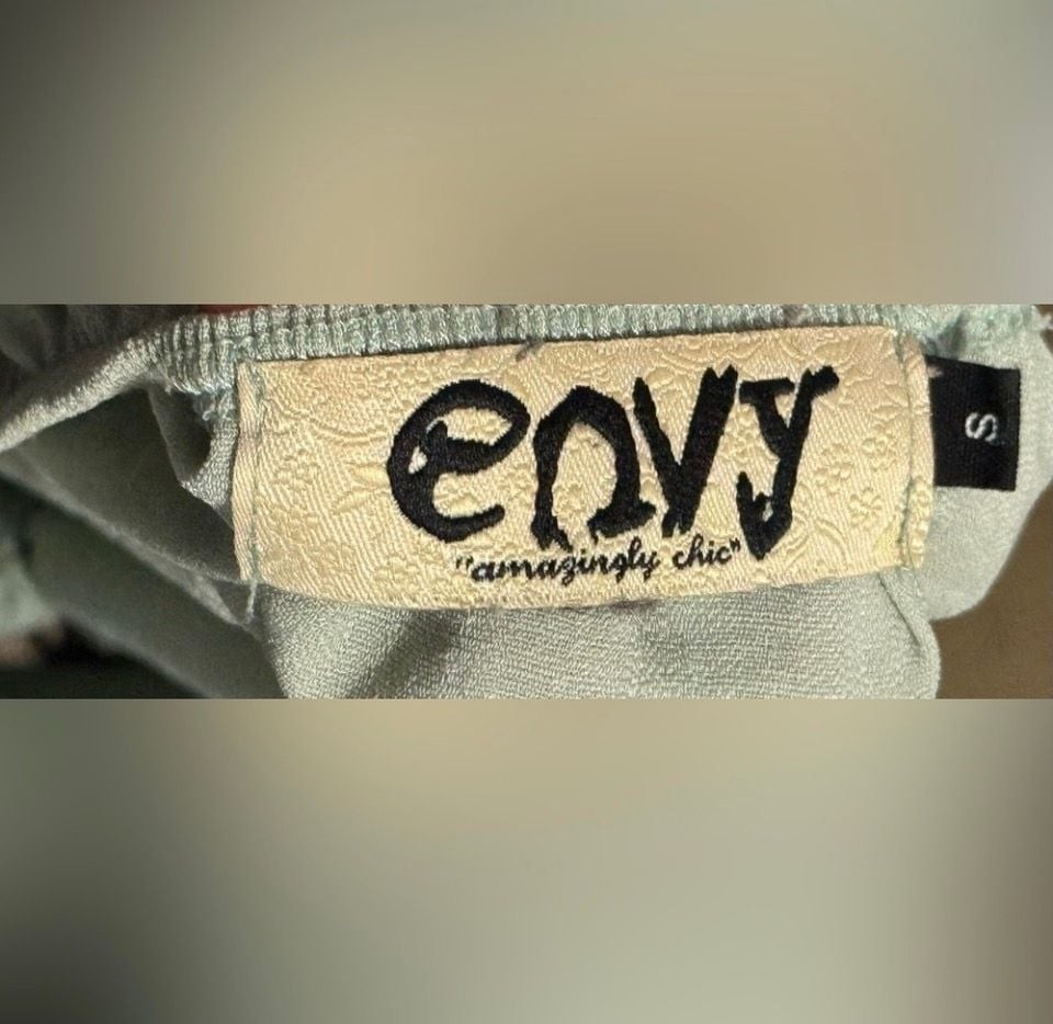 Envy ‘Amazingly Chic’ Sage Green Off-The-Shoulder Tassel Trim Blouse
