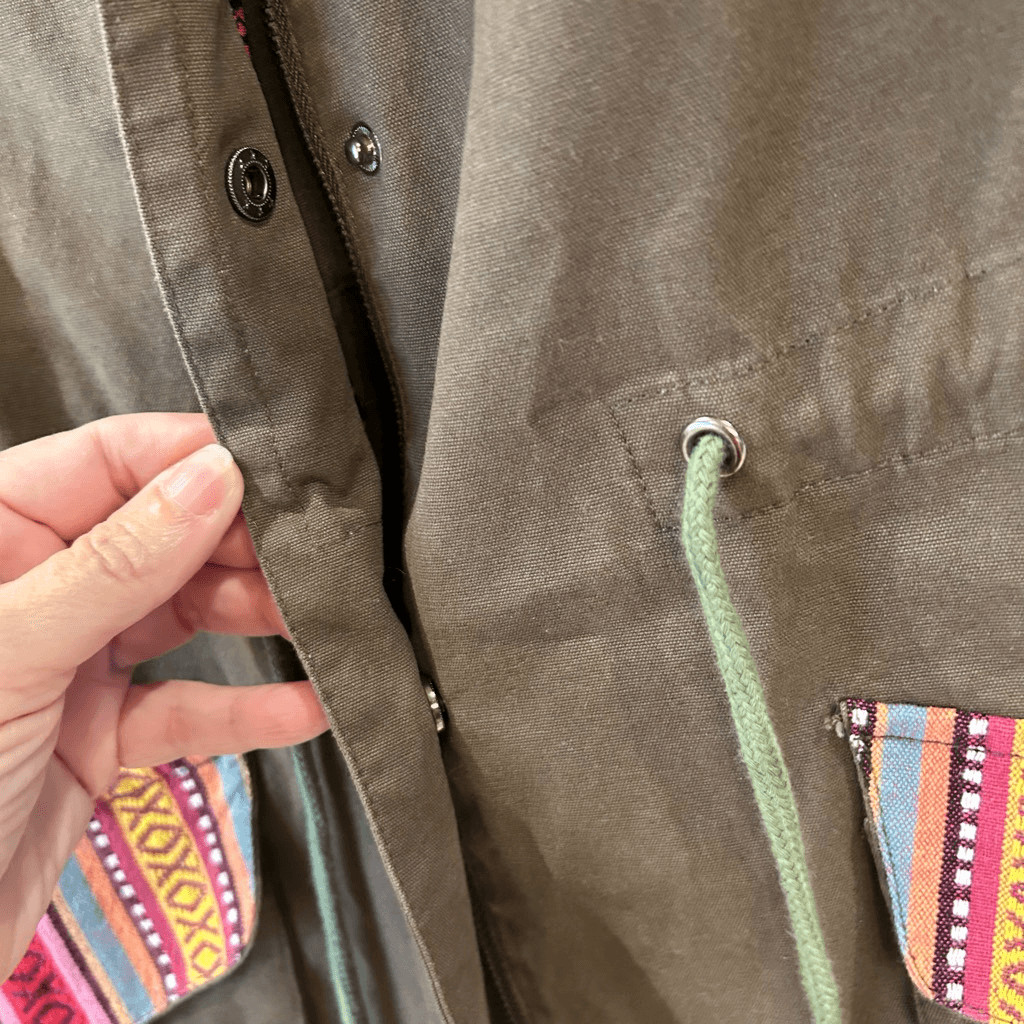 En Creme olive cargo vest with multi colored pocket size medium NWT