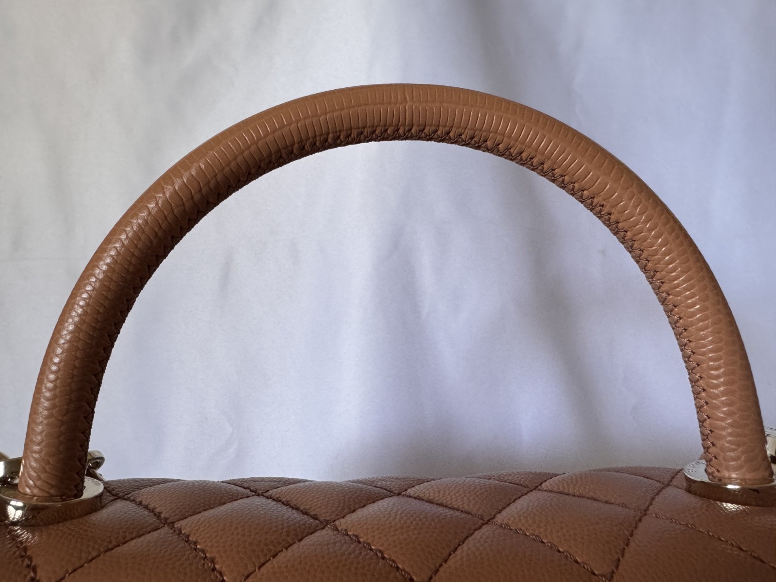 Chanel small flap bag with top handle caramel/cognac brown caviar leather