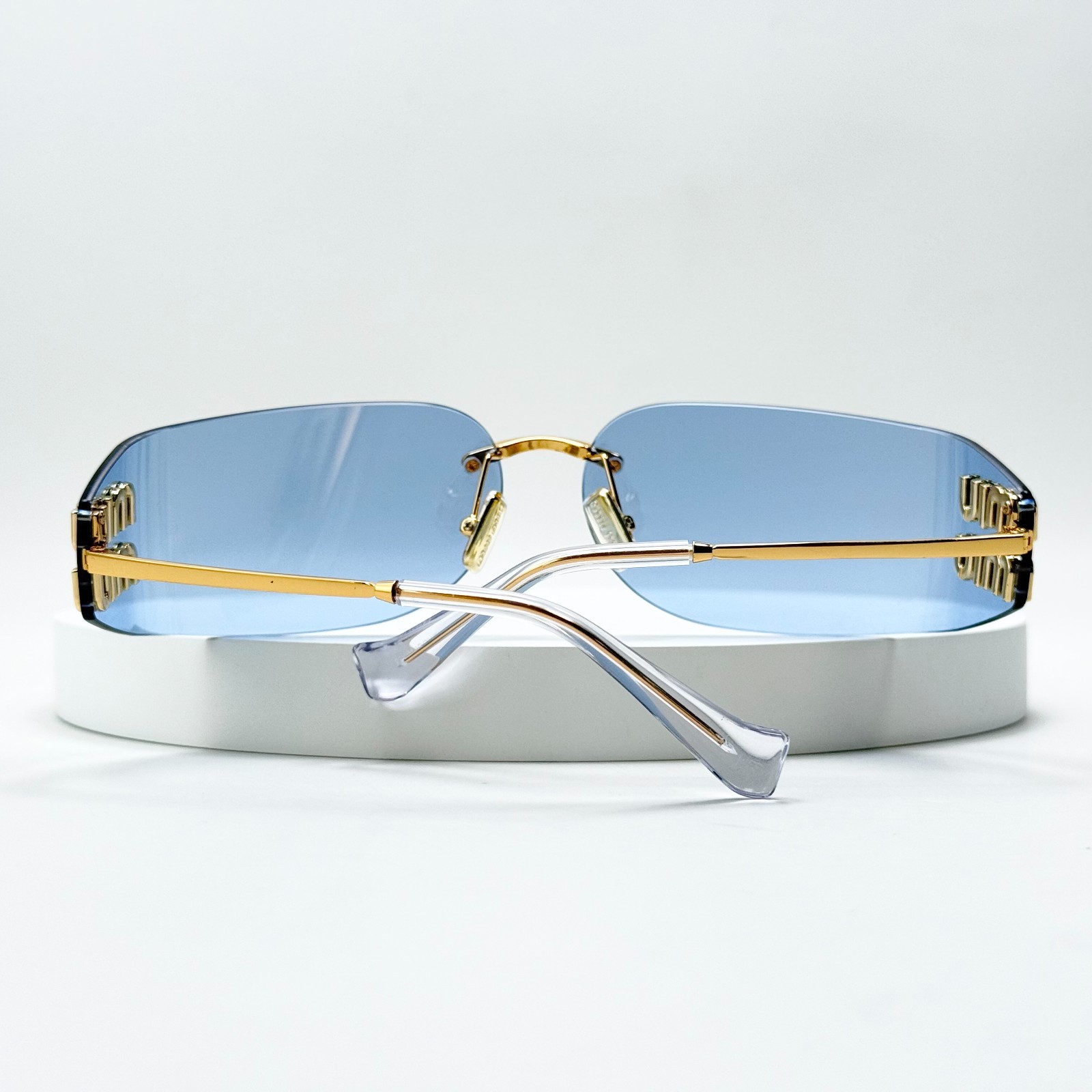 Miu Miu SMUA51 Wrap Sunglasses Pale Gold Frame Blue Lens Women 75-14-110