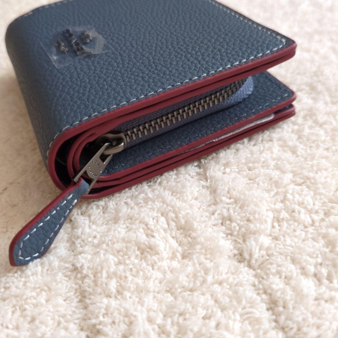 Brand new unused limited collaboration Coach Snoopy bifold wallet with box navy