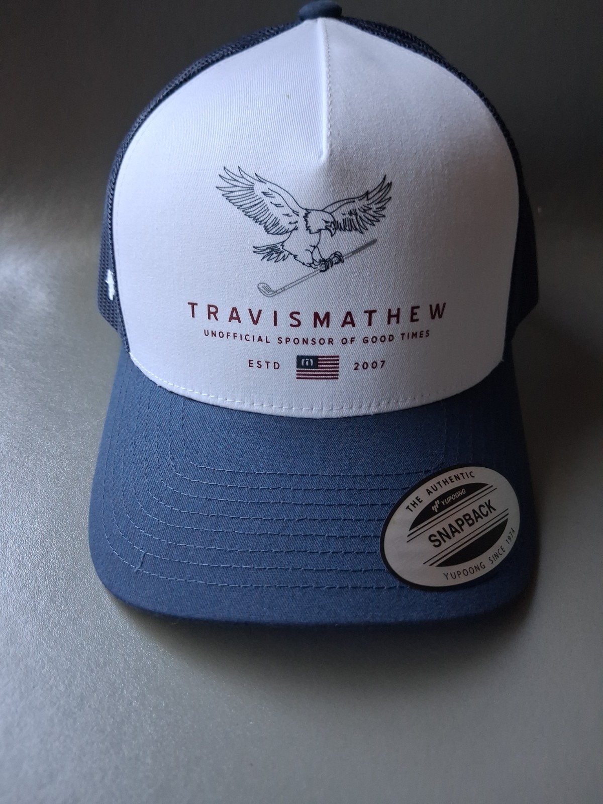 Brand New SNAPBACK- EAGLE – GOLF- Travis Mathew- NAVY – WHITE- RED -California
