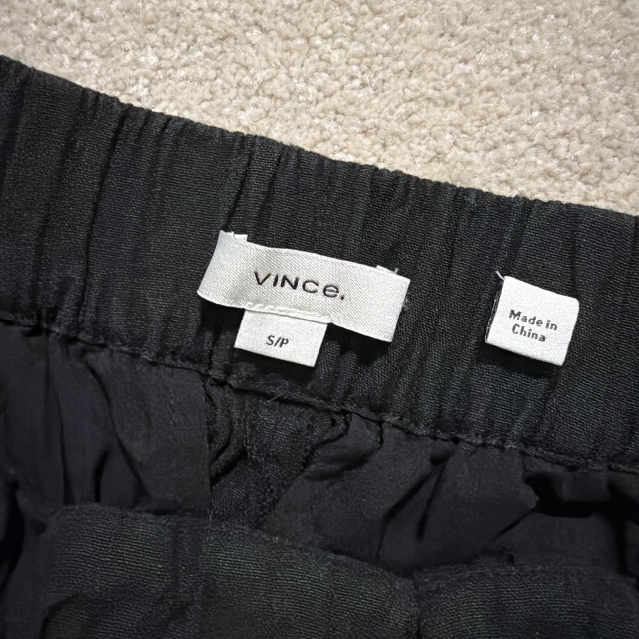Vince black pull-on trousers with an elastic waist and relaxed wide leg cut