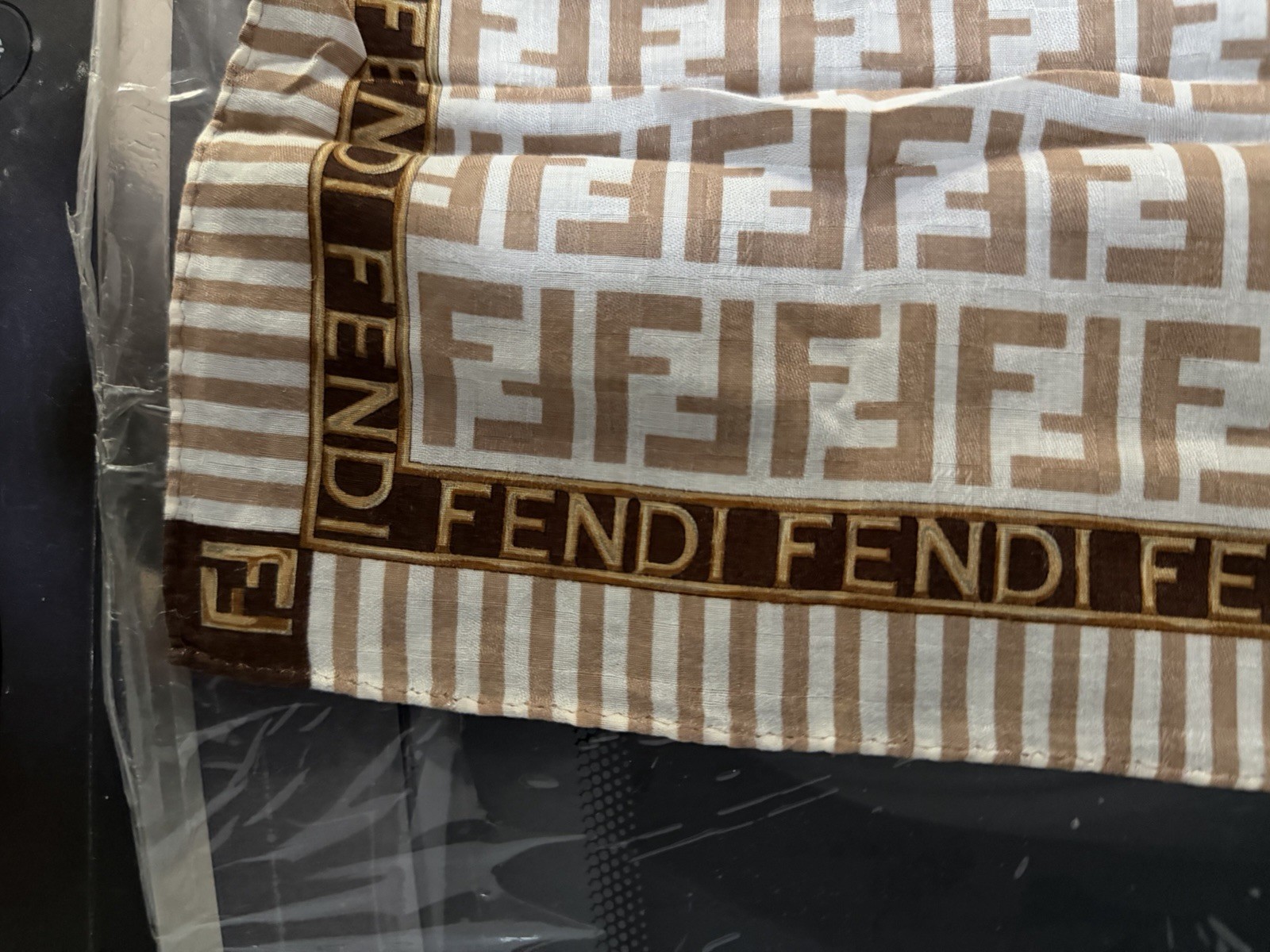 Authentic Fendi Brown/white FF stripe scarf with “FENDI ROMA 1925” seal?