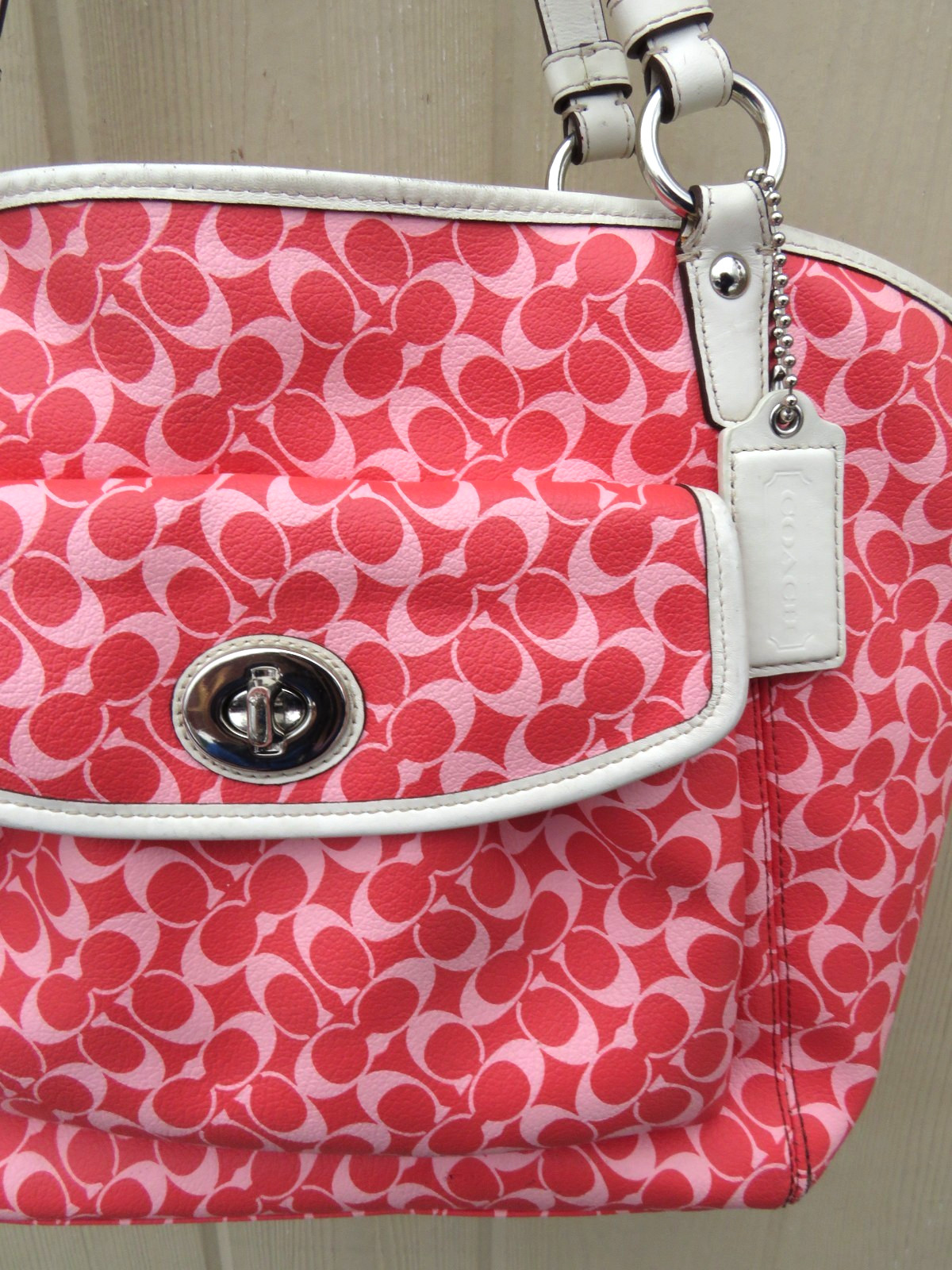 Coach Chelsea Leah Medium Shoulder Tote Bag in Papaya features a signature C