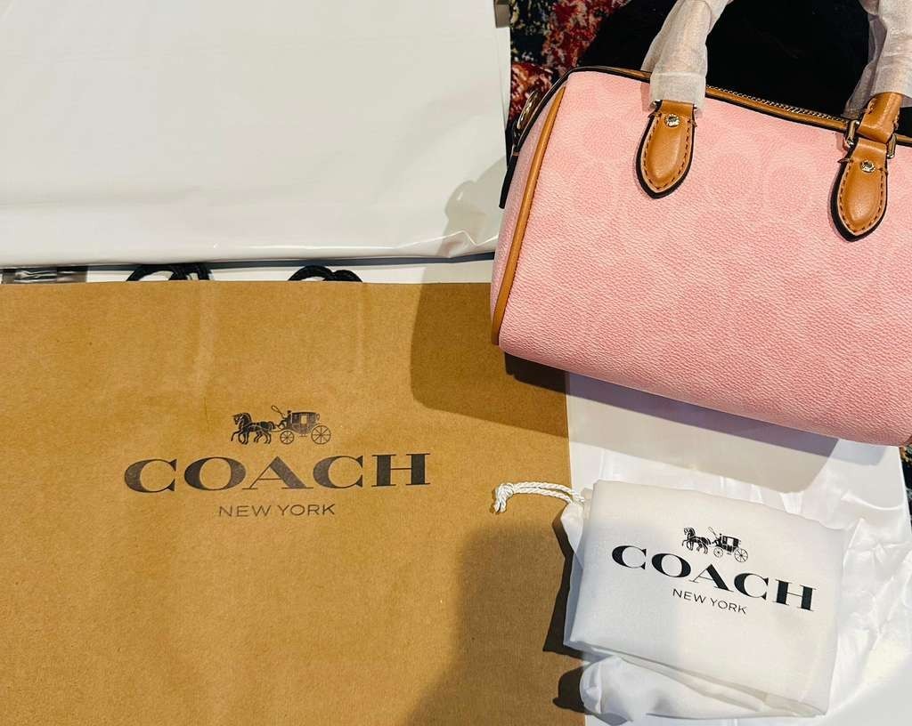 Coach Mini Rowan Crossbody Bag In Signature With Charms in Powder Pink CEK79