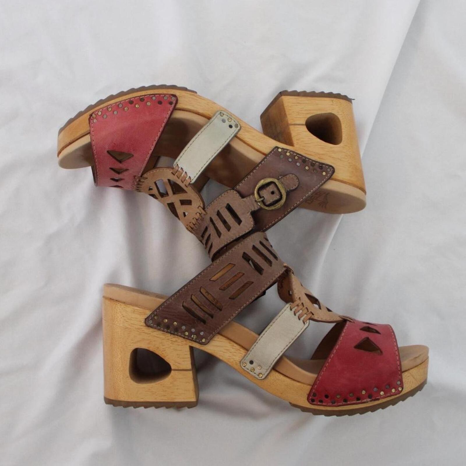 Dansko Oralee clogs with a leather upper with cut-out designs. size US 7.5-8