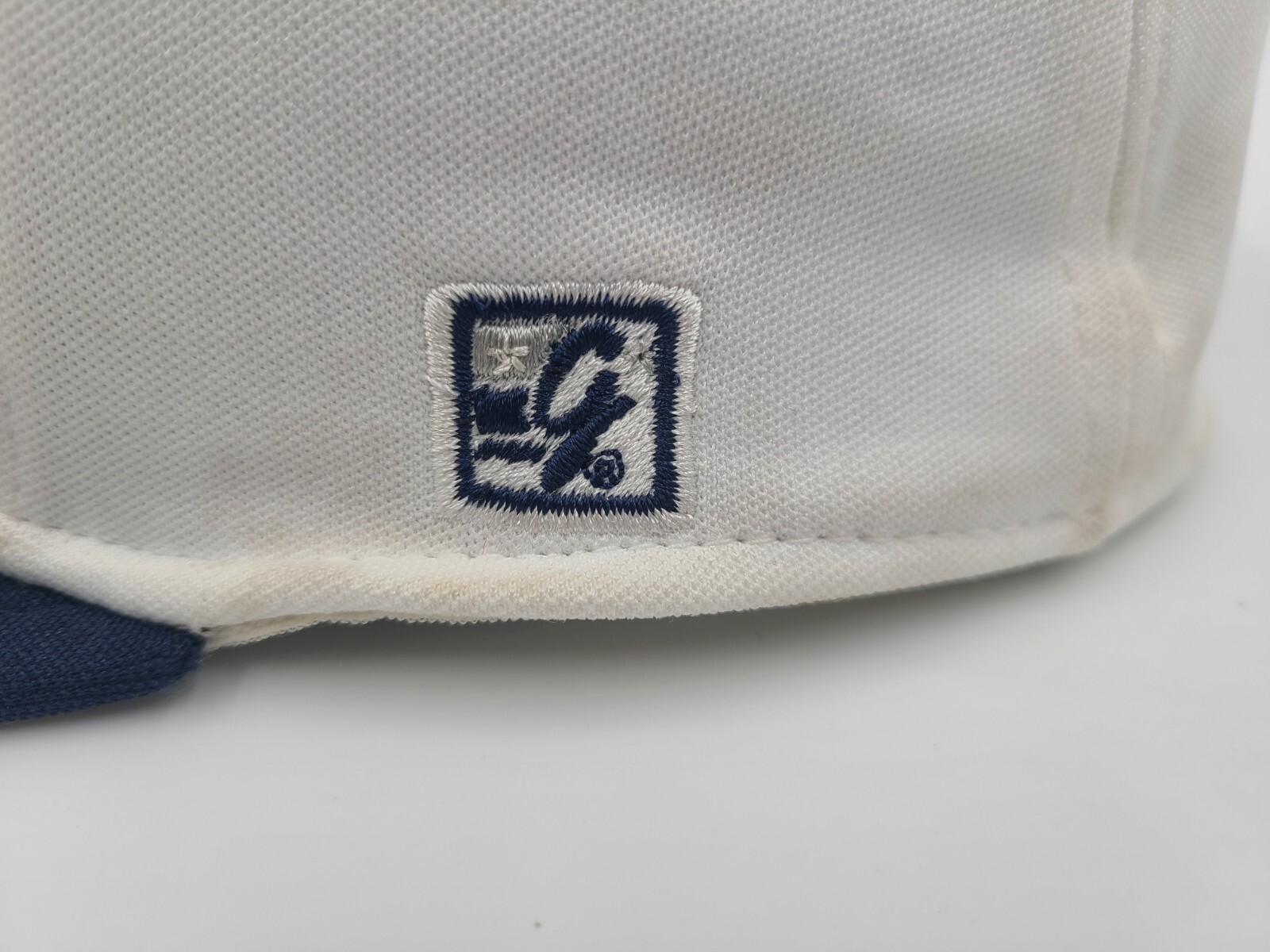 Northeastern High School Eagles The Game Pro Flex Fitted S Hat Cap White Blue