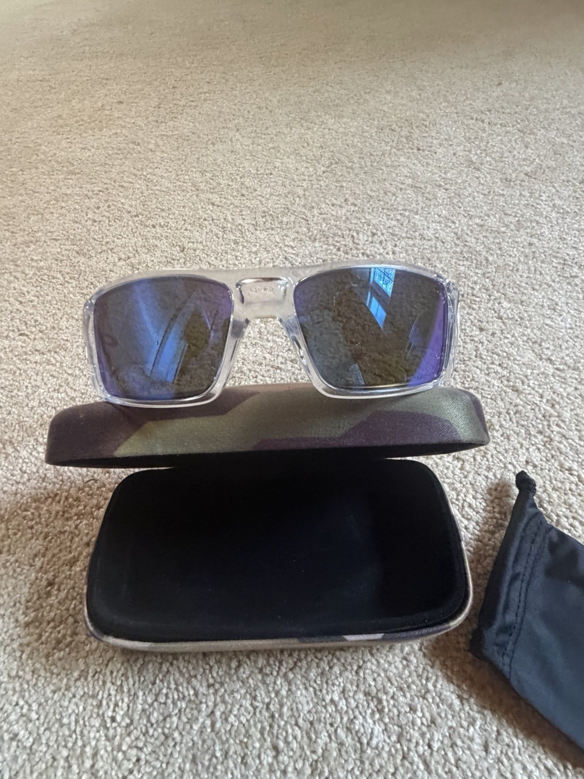 Oakley Sunglasses HELIOSTAT OO9231-0761 Clear Frame / PRIZM Sapphire POLARIZED