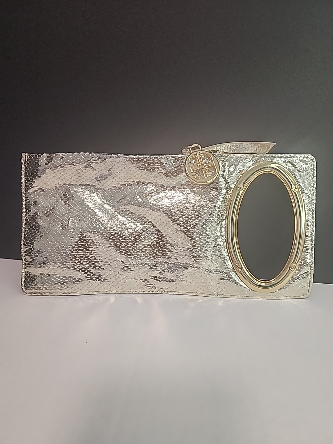 IMAN Metallic Metal Mesh Mini Clutch Silver Zippered Side Open Logo Metal Pull