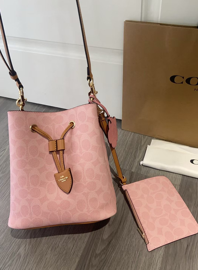 NWT Coach CEA23 Rowan Bucket Bag In Signature Canvas With Charms Powder Pink