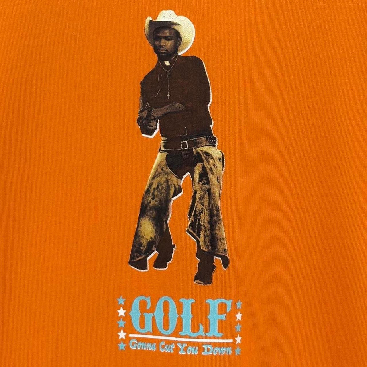 Golf Wang Orange Cotton T-Shirt with cowboy graphic, ‘Gonna Cut You Down’