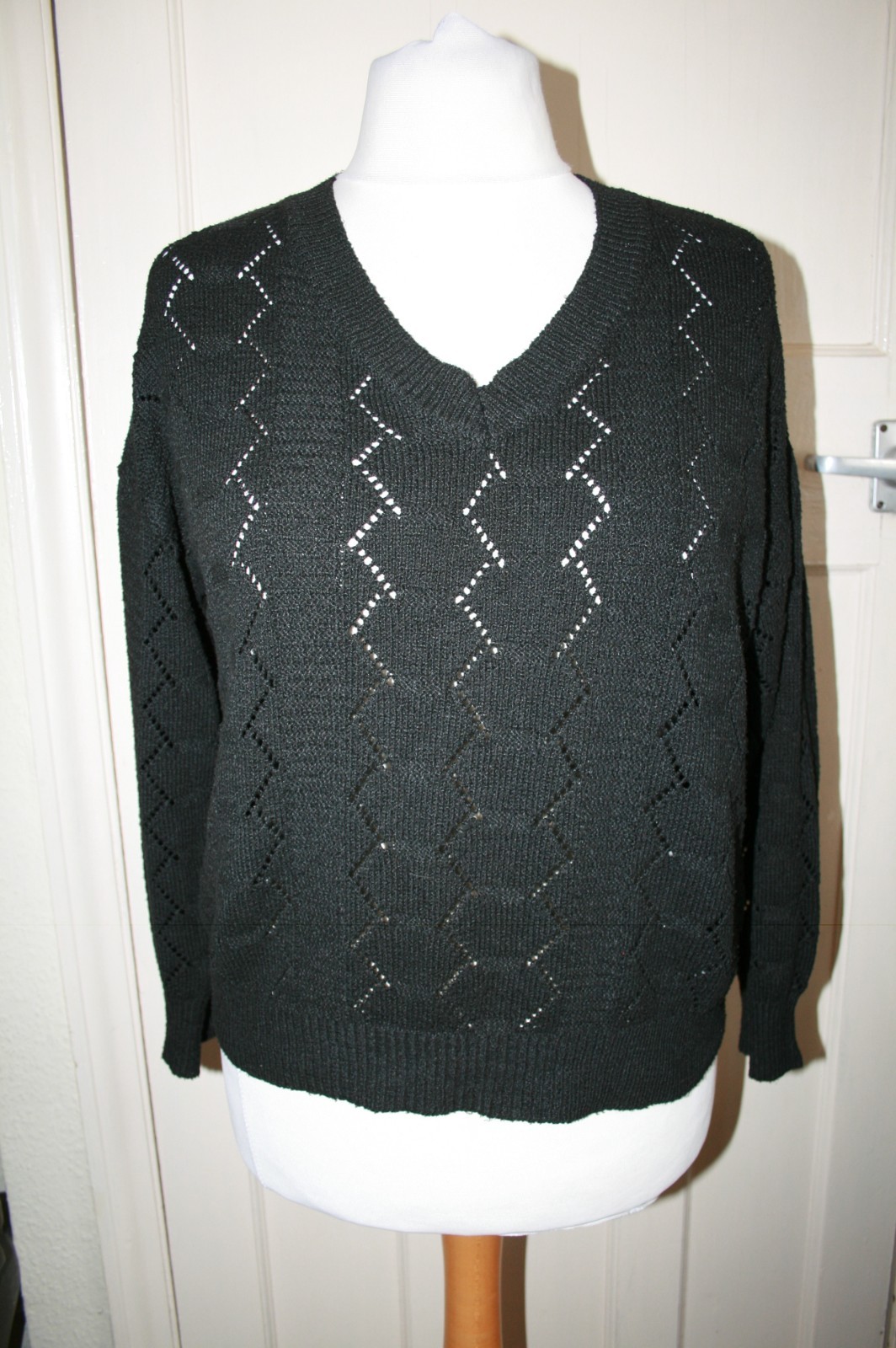 SIZE 16 BLACK LONG SLEEVE JUMPER WITH OPEN PATTERN IN FABRIC