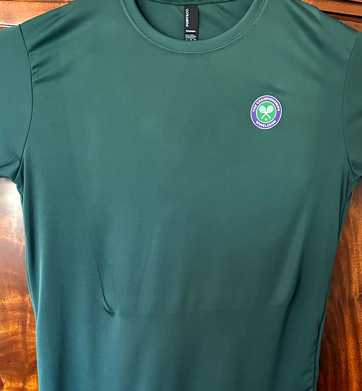 Wimbledon Logo Dark Green SS T’s 3.8-OZ, UPF50 100% Poly Dry-Fit / Limited Run