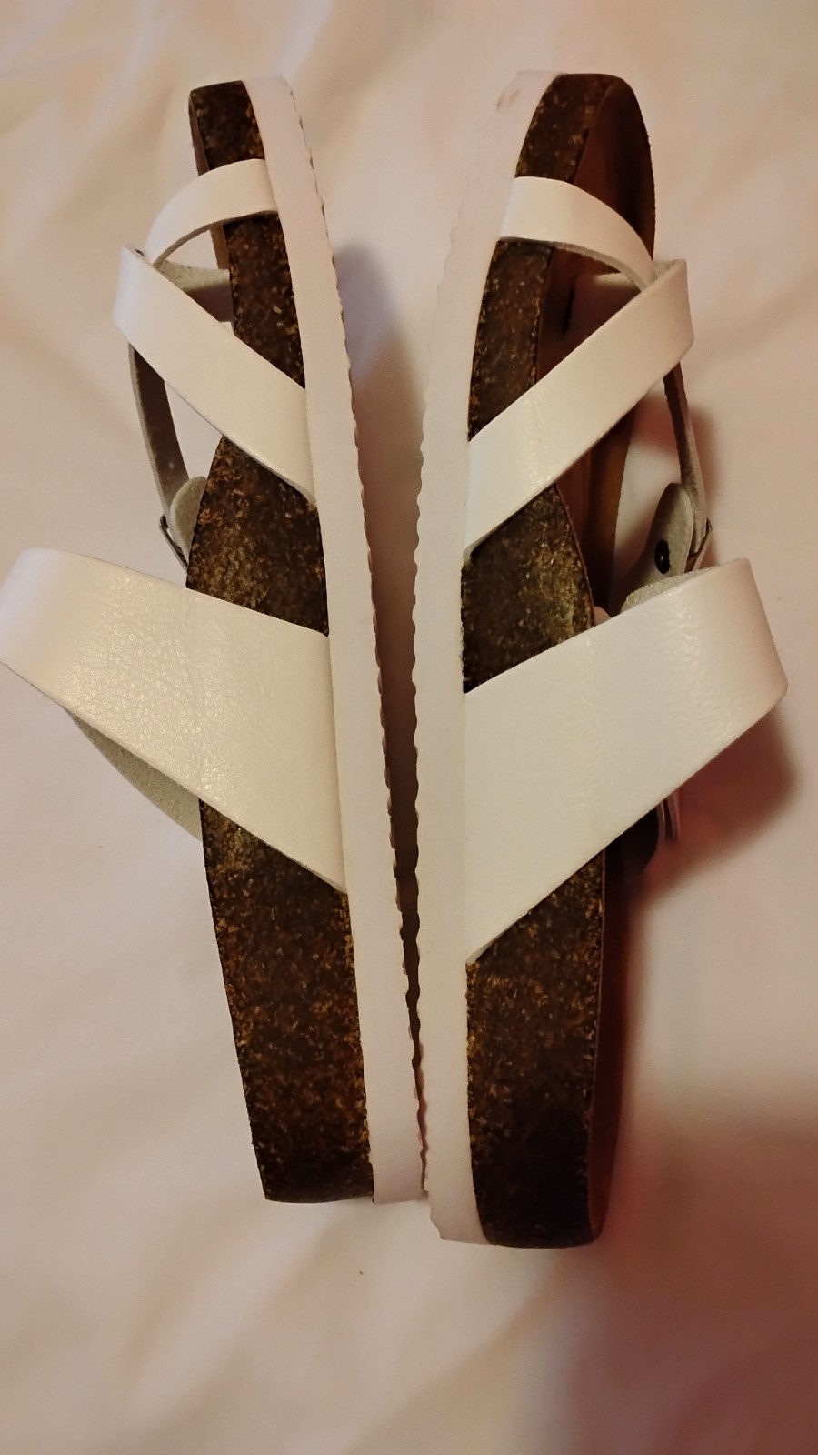 Open Toe And Open Back White Sandals With Buckles On Top