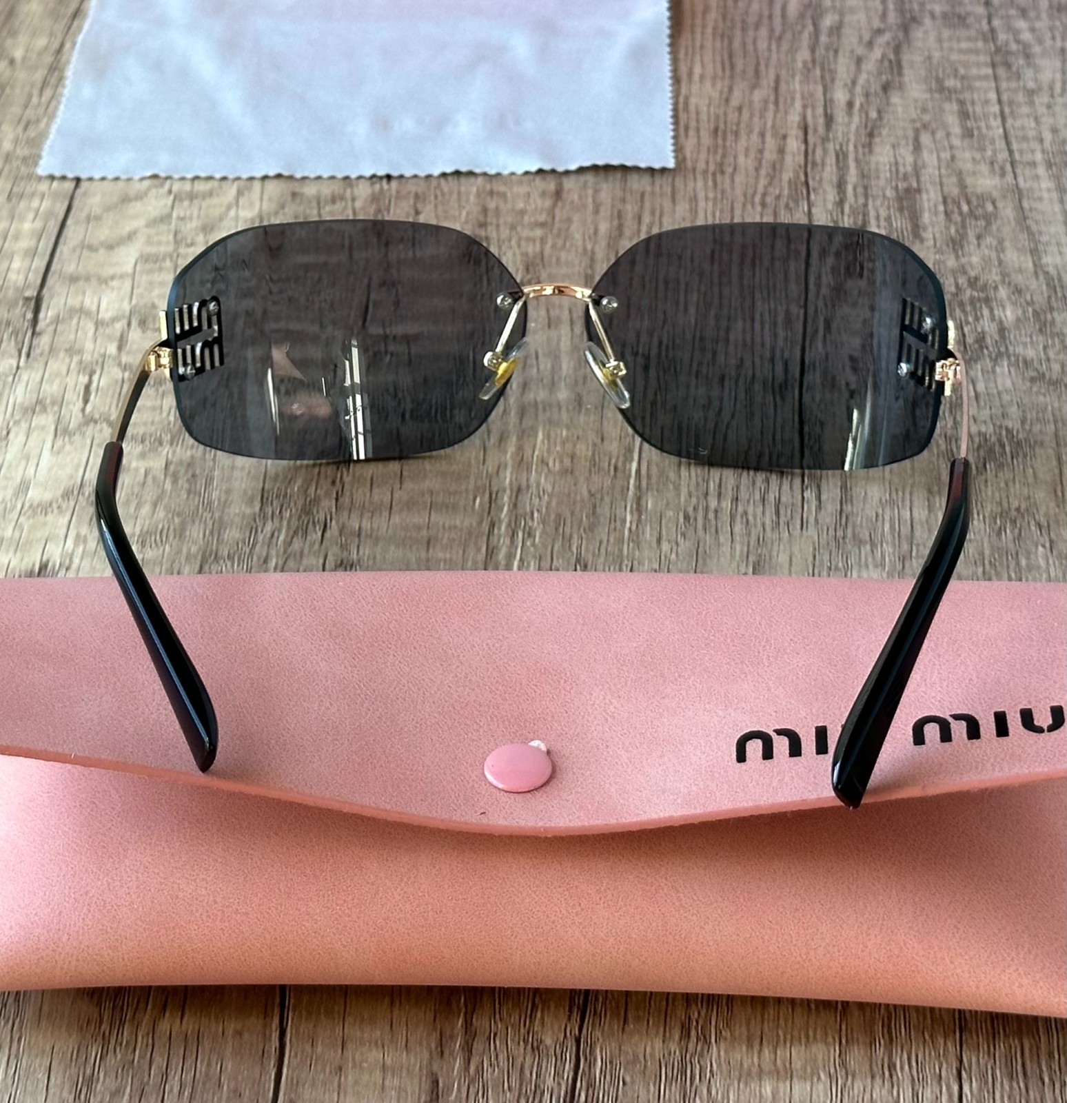MIU MIU SUNGLASSES BLACK GRAY 100% AUTHENTIC WITH ORIGINAL PACKAGE SHIELD