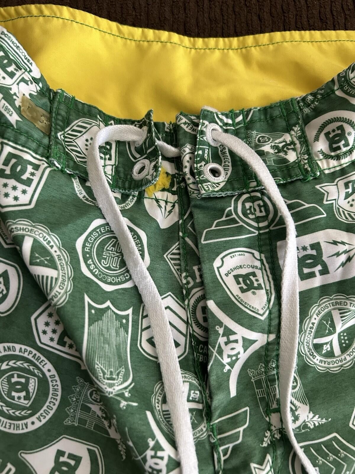 Vintage Y2K DC Shoes Men’s Board Shorts Green Logo Print Size 38 W/ Wax Comb