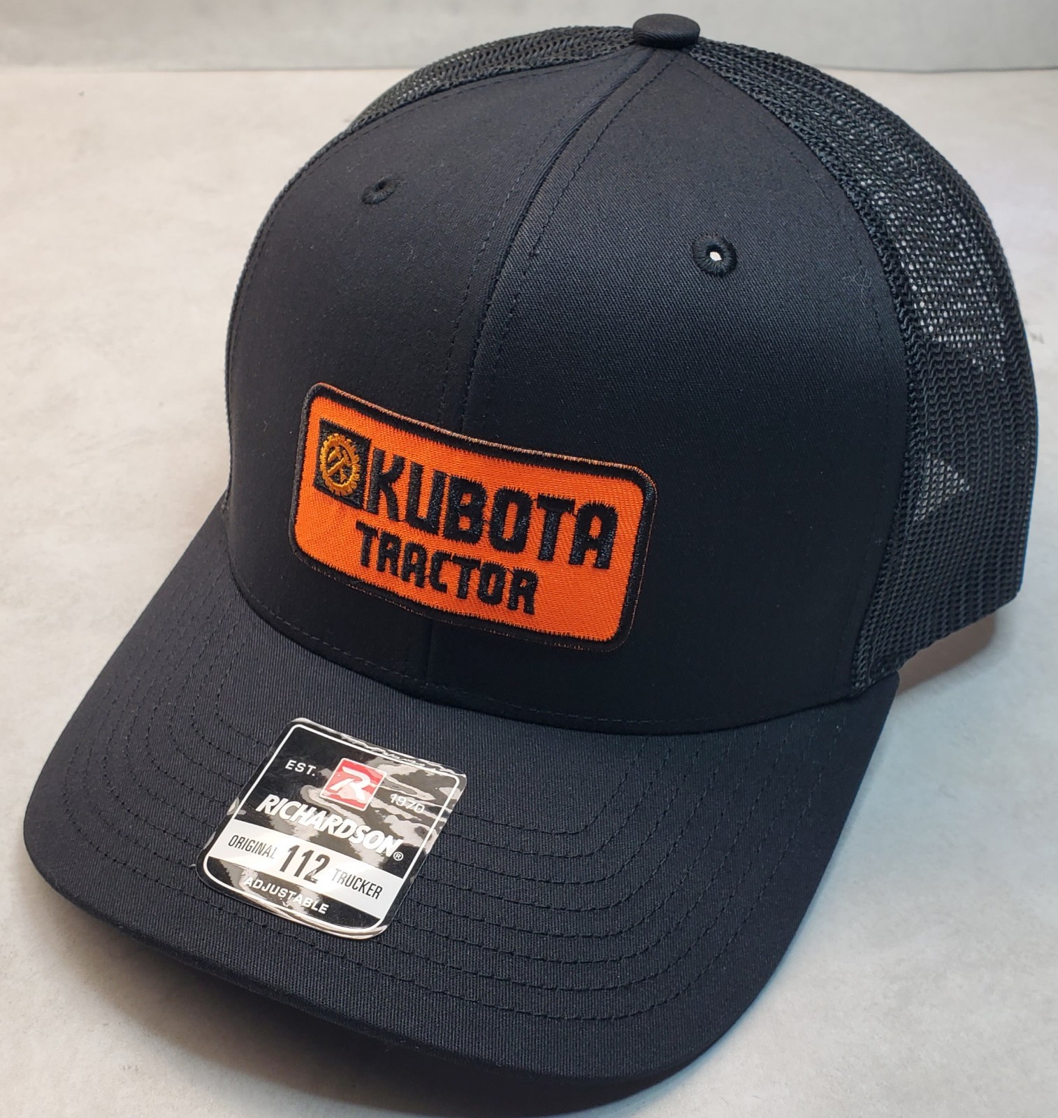 Kubota Tractor Emb. Patch on Richardson 112 Trucker Hat Snapback Black/Black