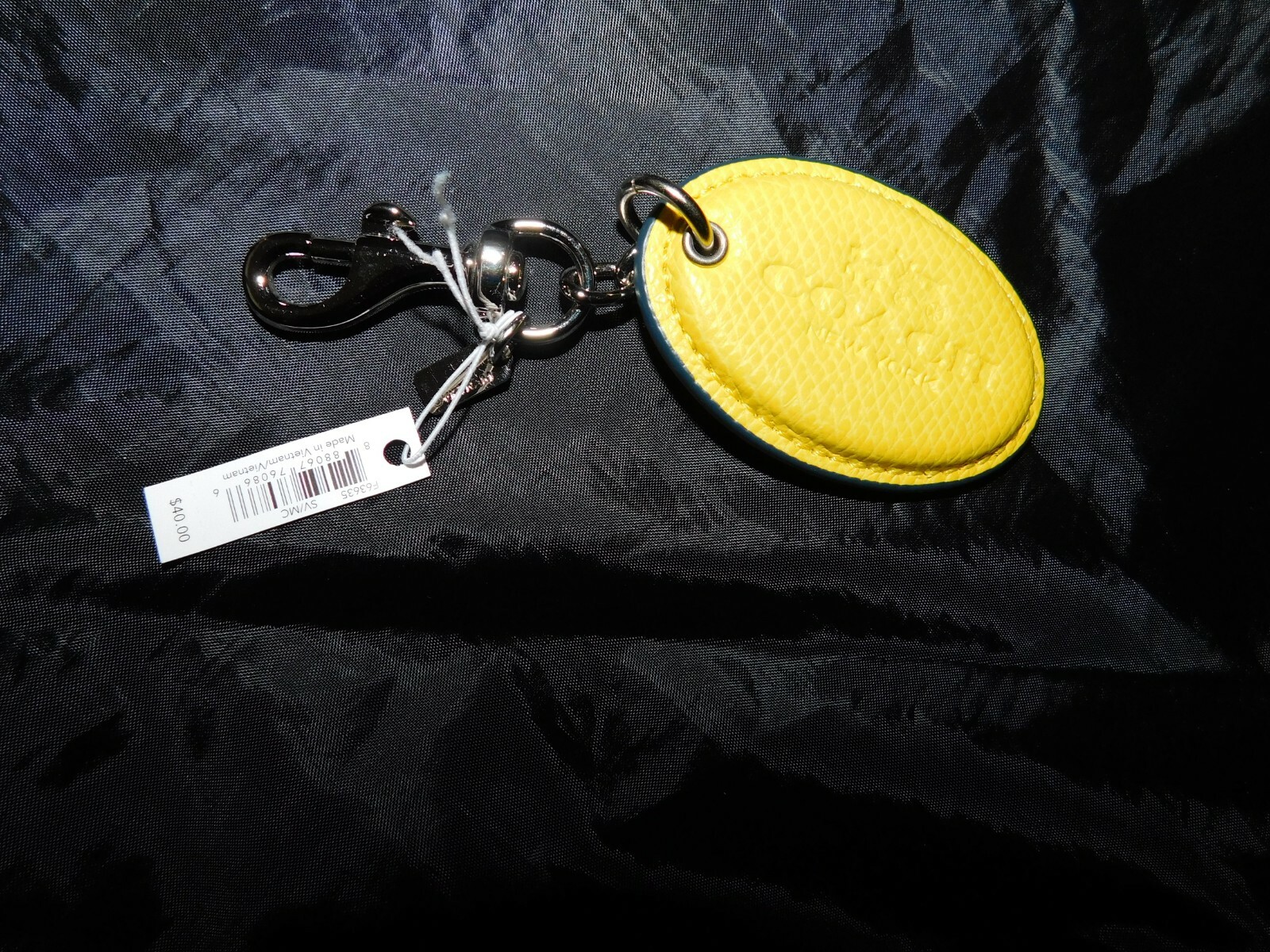 NWT “1” Coach Key Ring F63635 Badlands Oval Chalk. Keyring/Keychain/Bag Charm.