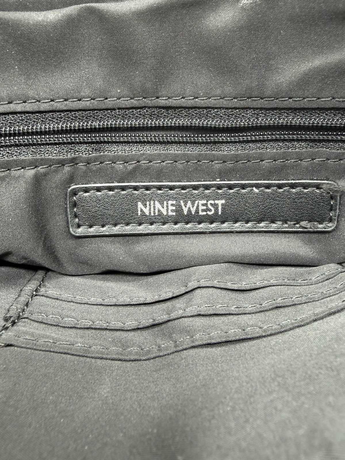 Nine West Black Crossbody Bag Purse Adjustable Strap Tassel Silver Hardware