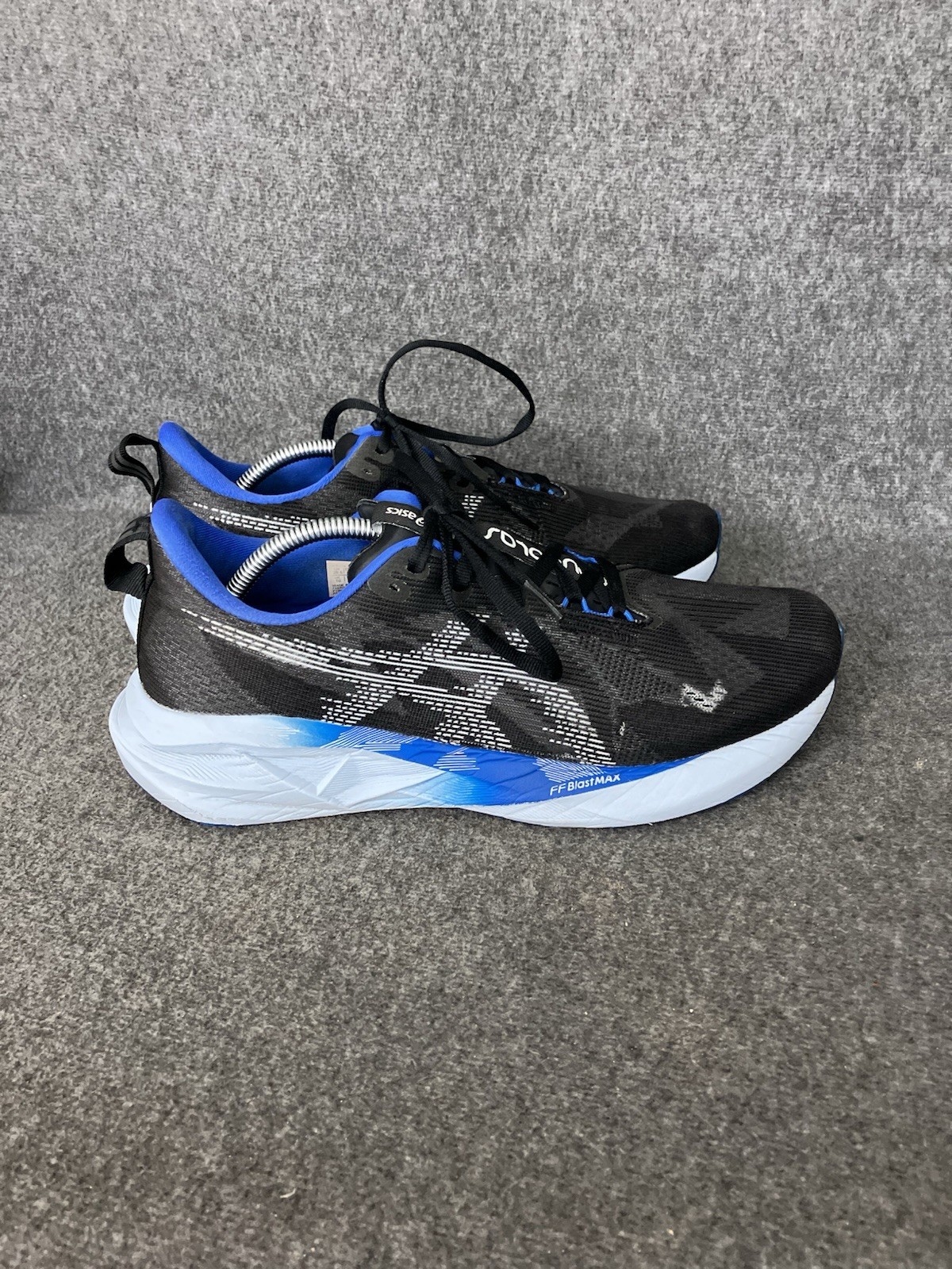ASICS Novablast 5 Mens 11 Black Blue Running Shoes Sneakers HOLES