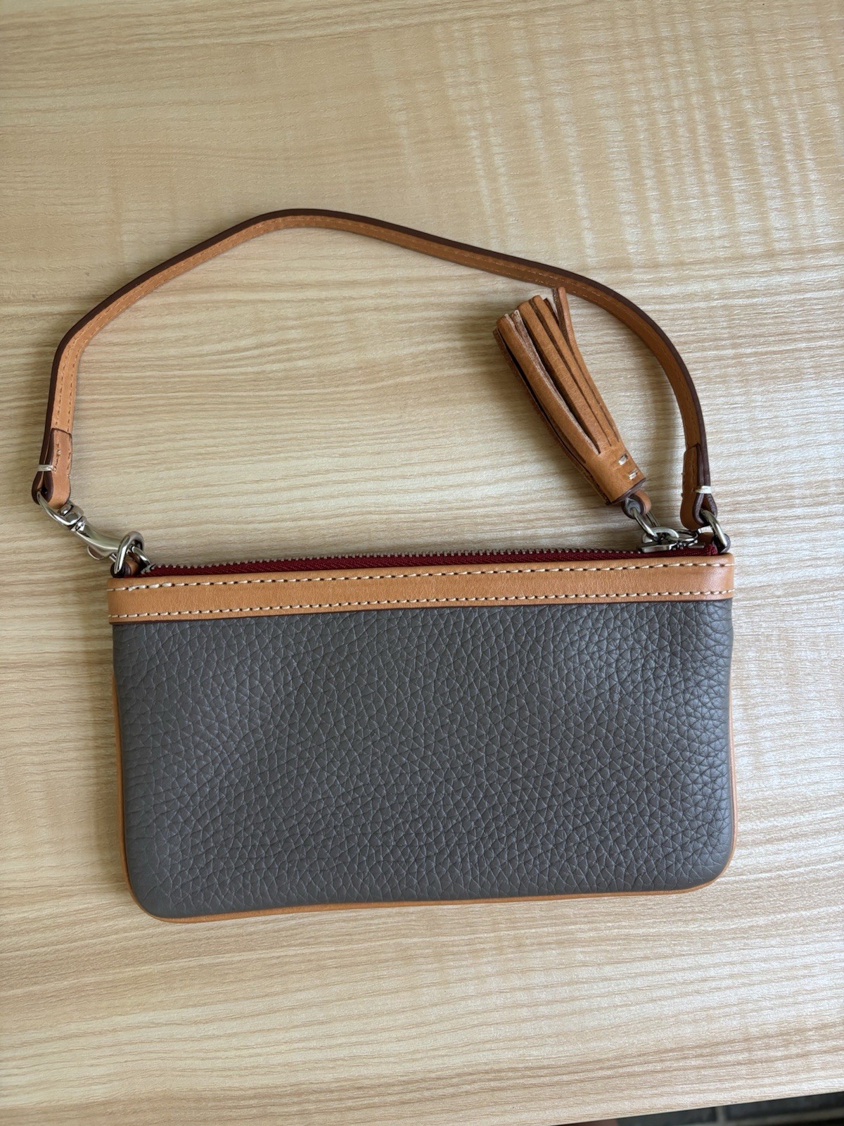 Dooney & Bourke Pebbled Zip Top mini bag with Brown Tan Detachable Strap Tassel