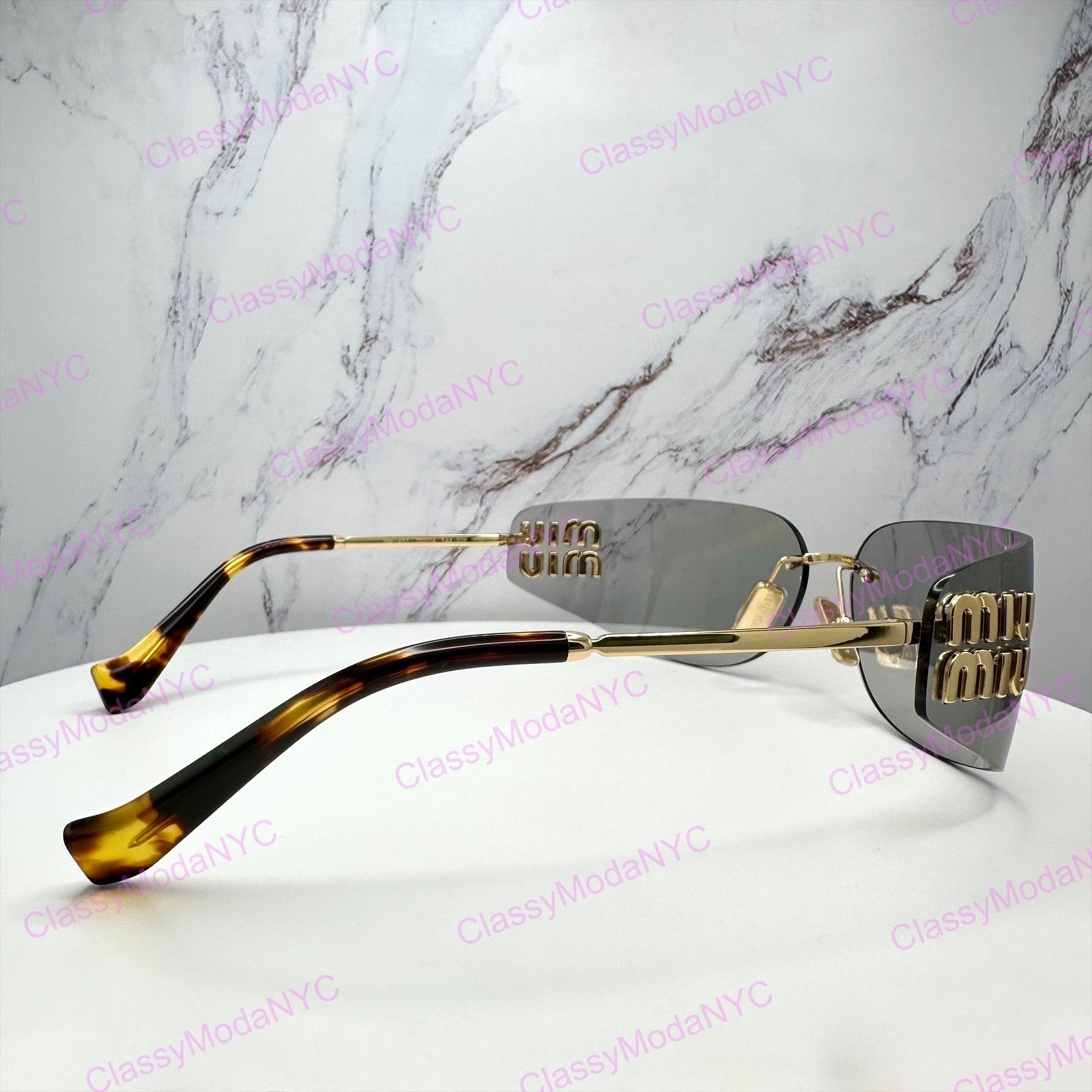 New MIU MIU Sunglasses Gold Slim Runway Wrap Rimless MU A51S 5AK50K Authentic