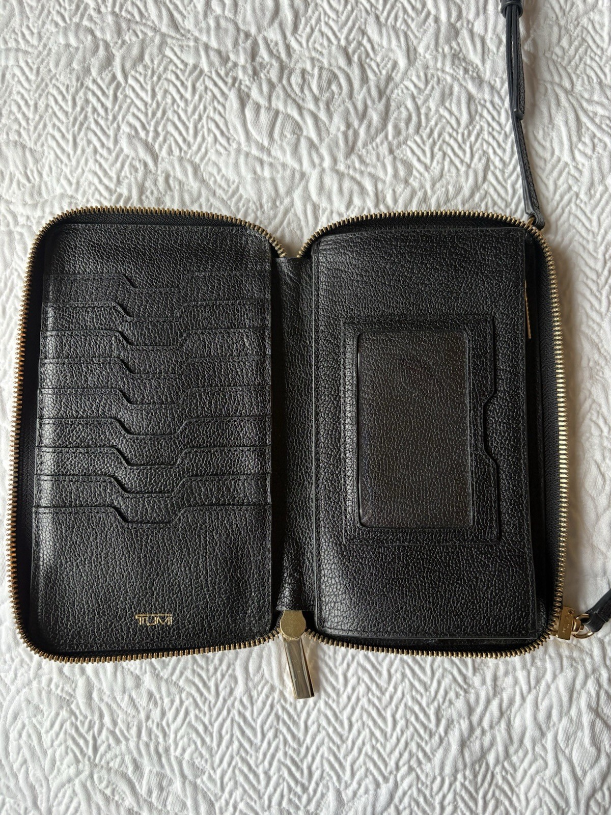 TUMI Black Pebbled Zip-Around Crossbody Wallet Bag Gold Hardware, Card Slots