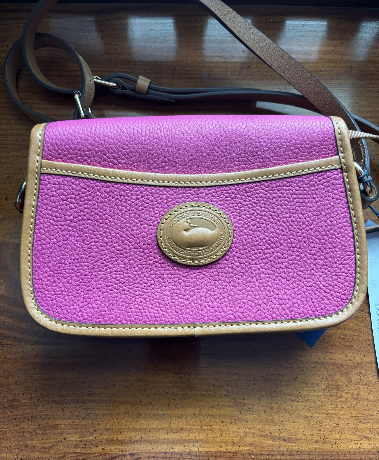 Dooney & Bourke Pebble Grain Turnlock Crossbody 22 in Fuchsia, new with tags