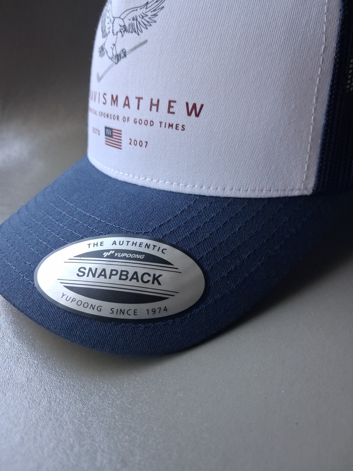 Brand New SNAPBACK- EAGLE – GOLF- Travis Mathew- NAVY – WHITE- RED -California