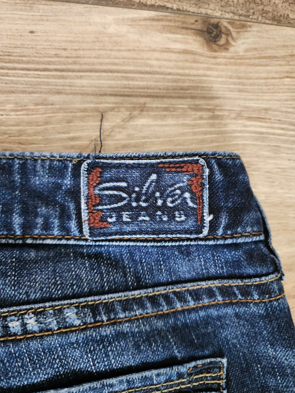 Silver Jeans Eden Flare Womens Jeans | Dark Wash Distressed | sz 31/33