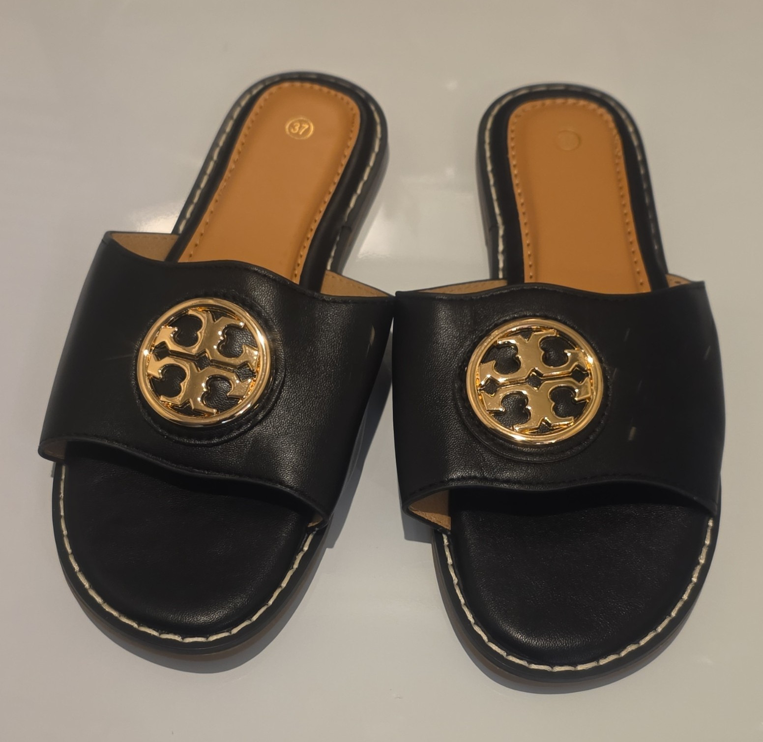 Women’s Black/Gold Leather Slip-On Slide Sandals Flat Logo Medallion US 7
