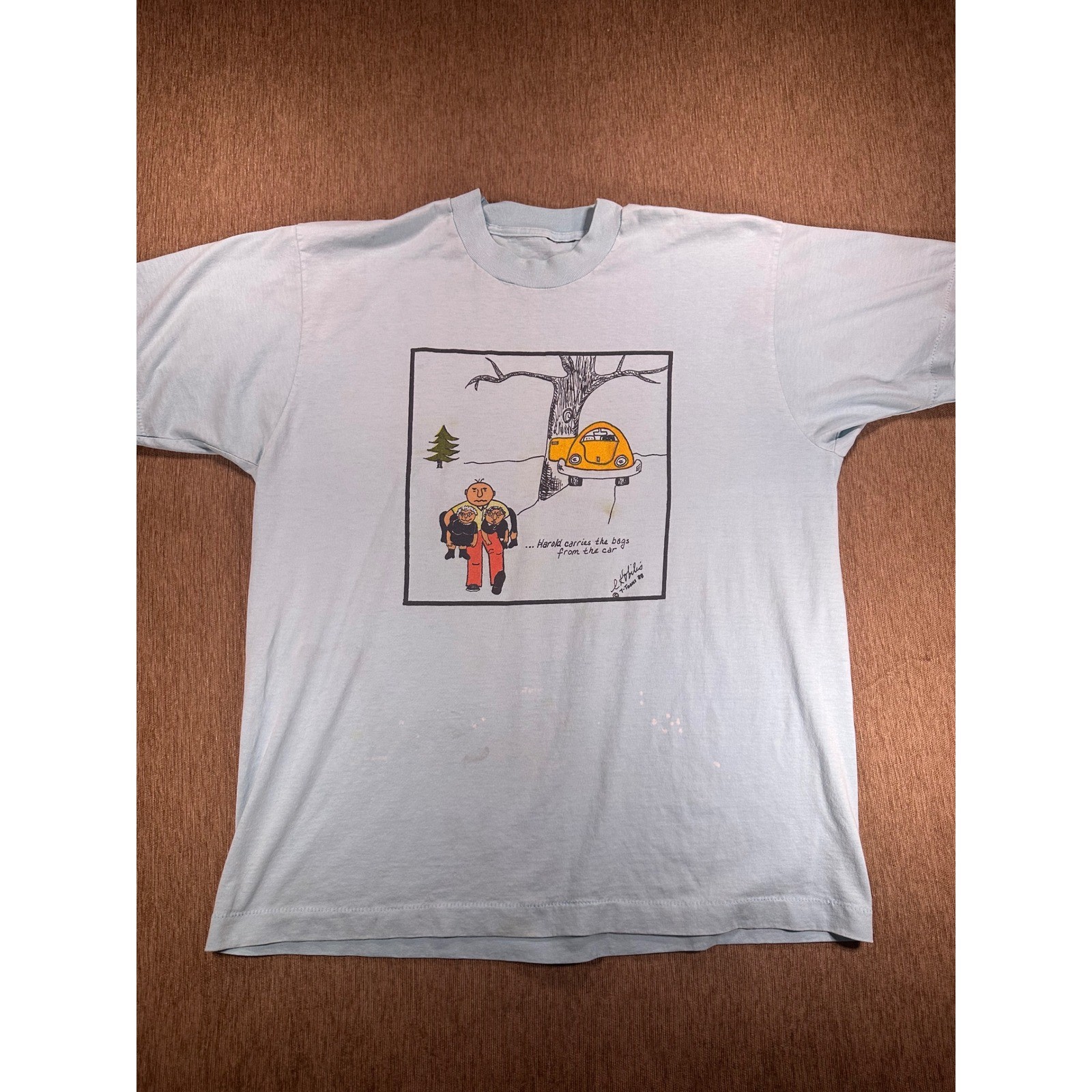 VTG 1988 T-Toons Harold Carries The Bags Cartoon T-Shirt Light Blue L Kobilis