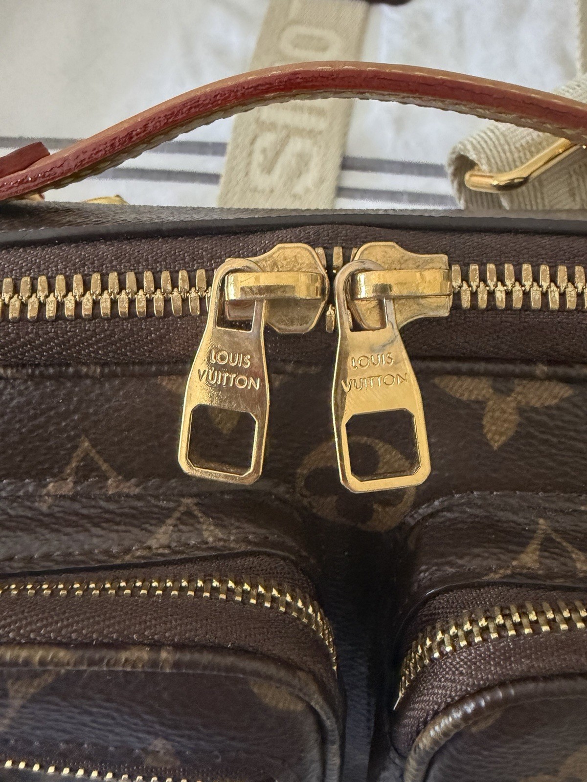 Louis Vuitton Monogramed Utility Bag Cross Body With Adjustable Strap