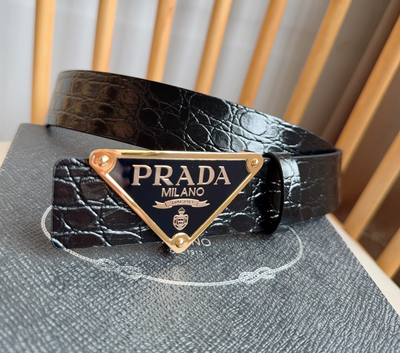 Prada men’s black-button black leather belt