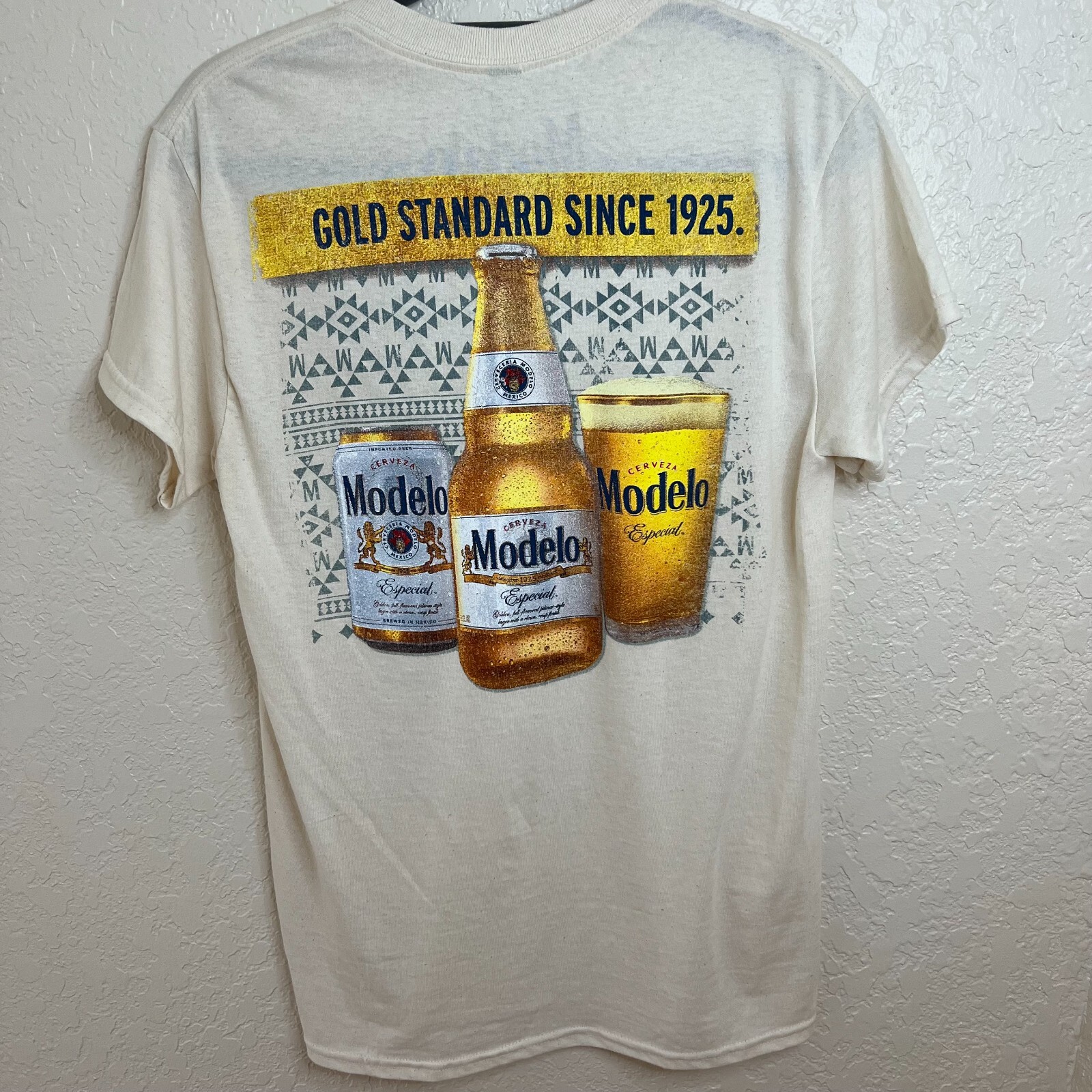 Modelo Cerveza Men’s Small Logo Graphic T-Shirt “Gold Standard Since 1925” NEW