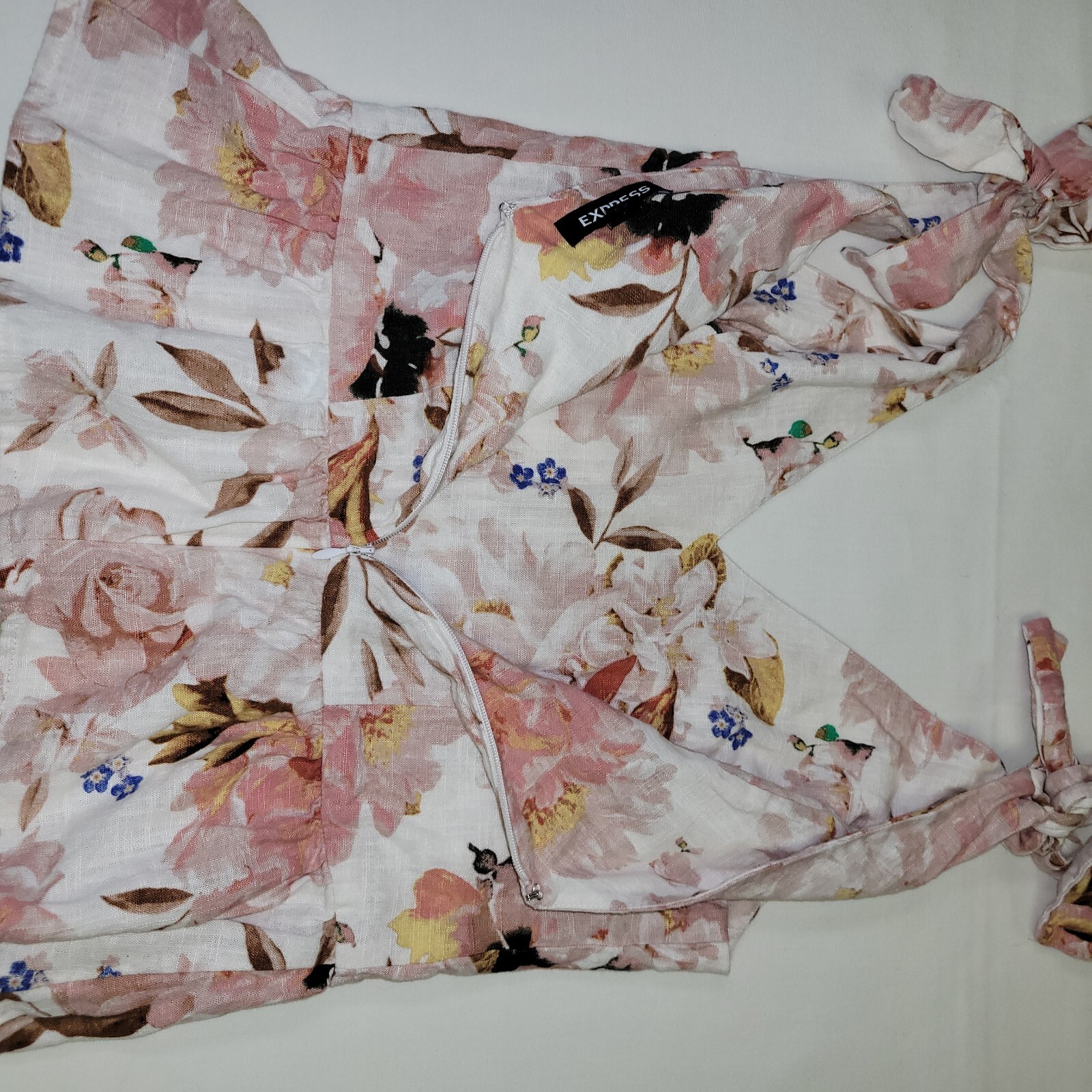 Express womans top floral sleevless tie staps ruffle zipper