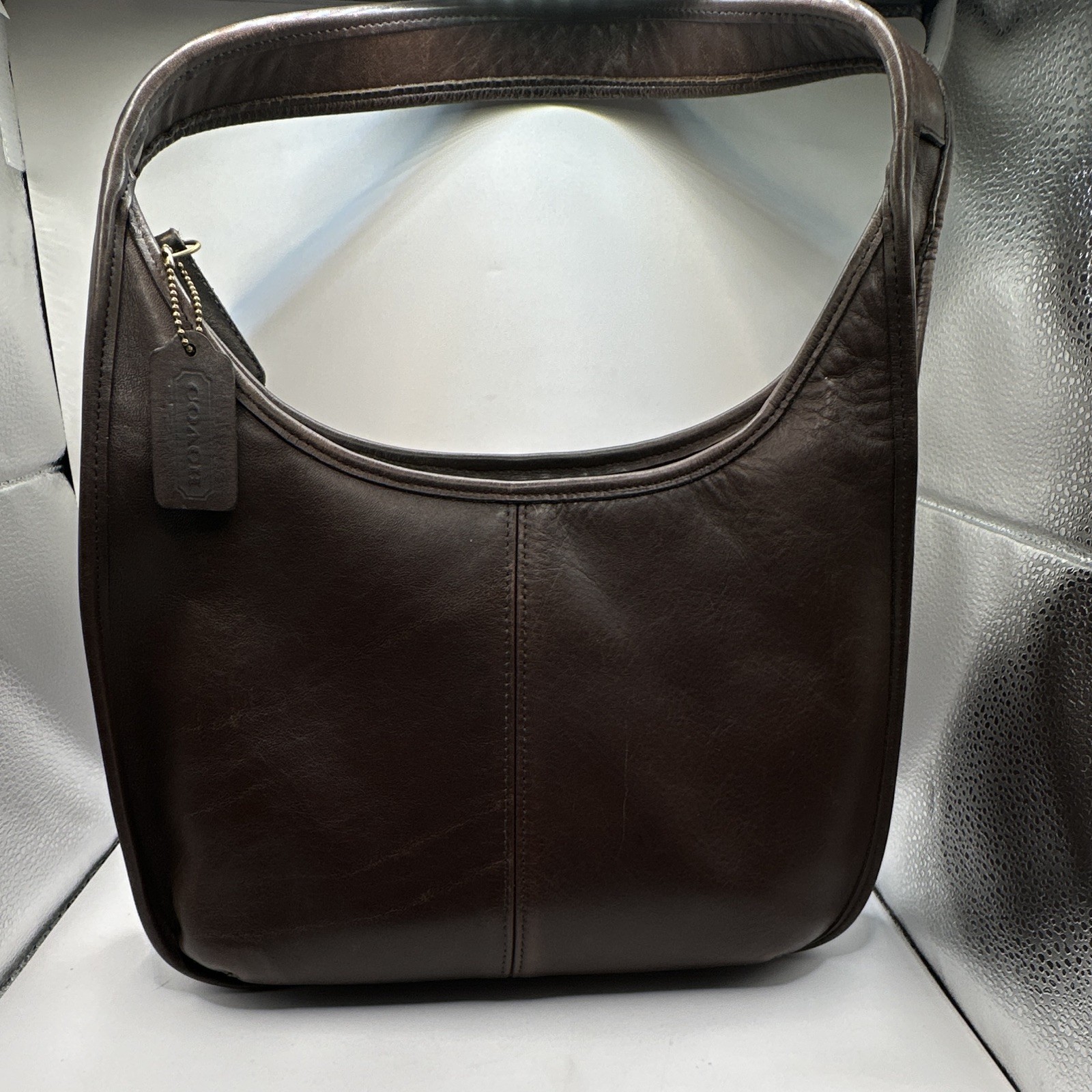 vintage Coach Ergo Zip Hobo Shoulder Bag crafted from mahogany brown leather.