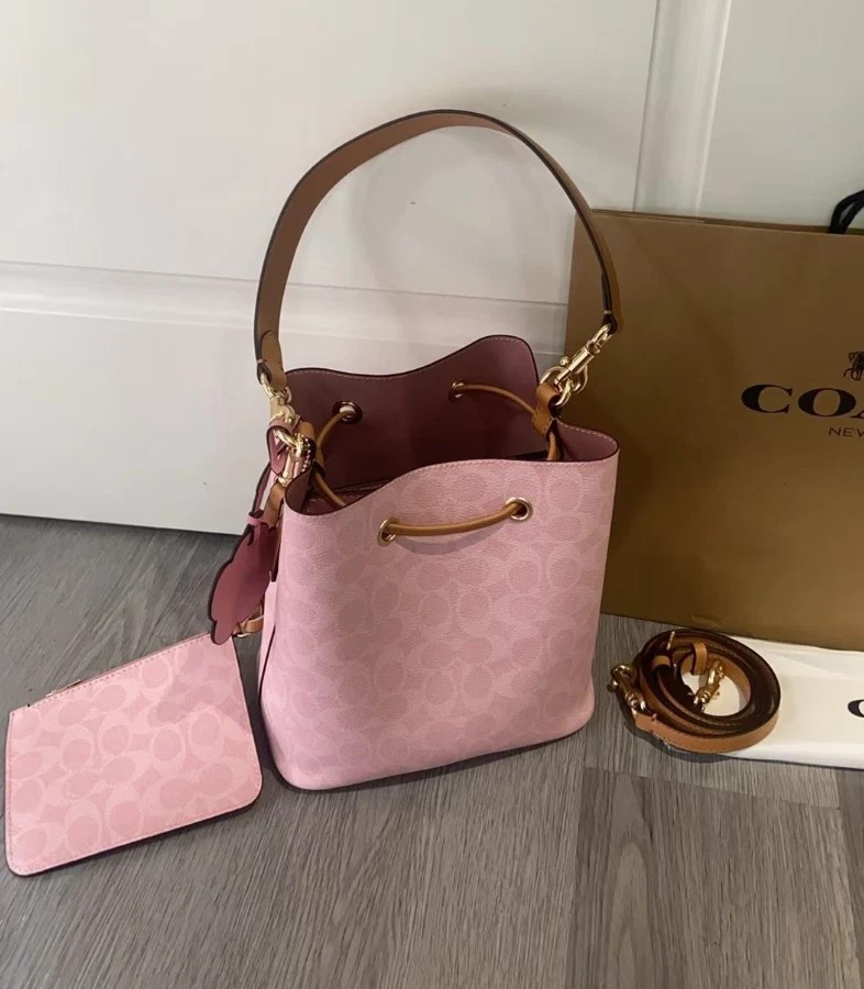 Coach CEA23 Rowan Bucket Bag In Signature Canvas With Charms Powder Pink Outlet+