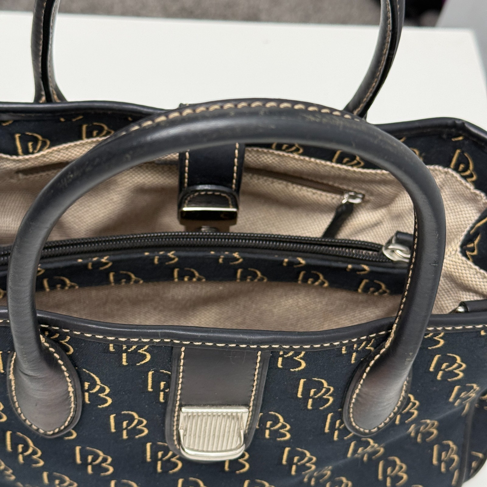 Dooney & Bourke DB Monogram Satchel Purse Black Gold Leather Trim Push Lock