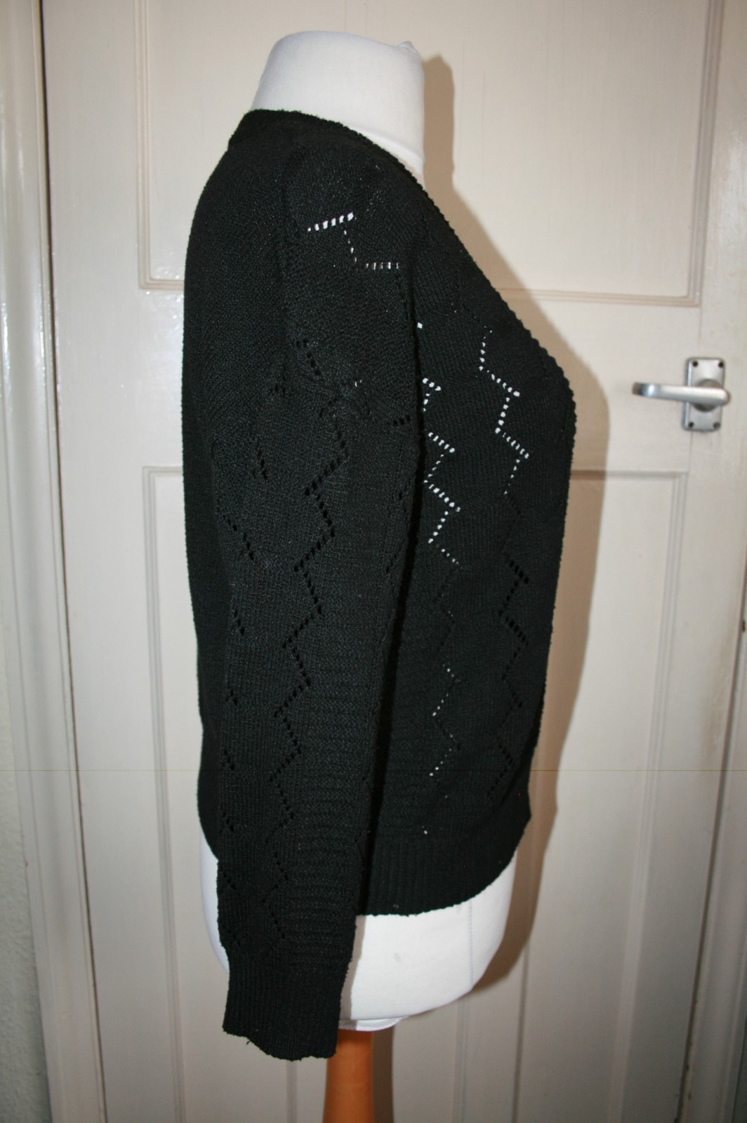 SIZE 16 BLACK LONG SLEEVE JUMPER WITH OPEN PATTERN IN FABRIC