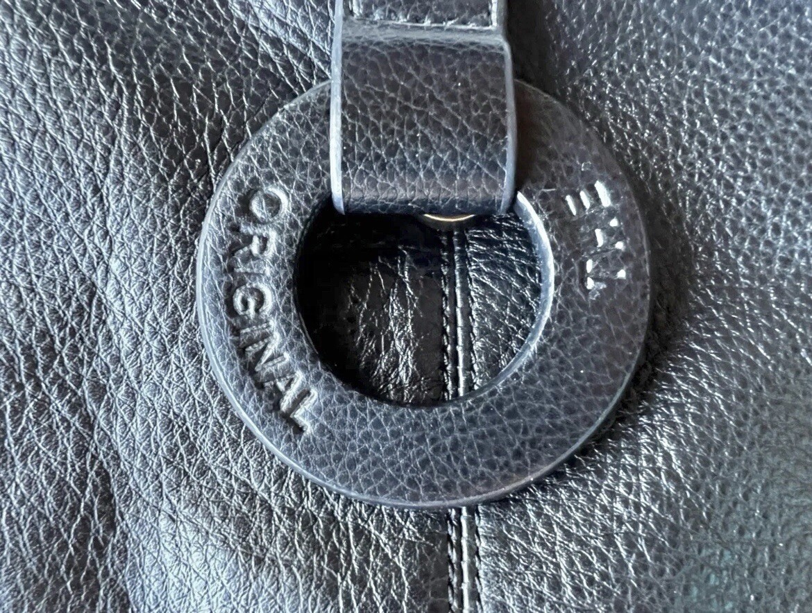 The Sak Handbag Logo Stitched Black Leather Zippered Pocket 10” Drop Handle