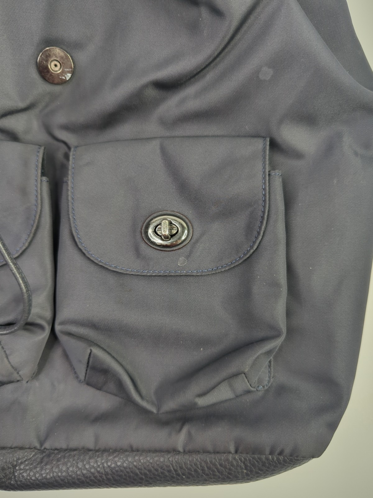 Coach Billie Navy Nylon & Pebbled Leather Turn Lock Drawstring Backpack