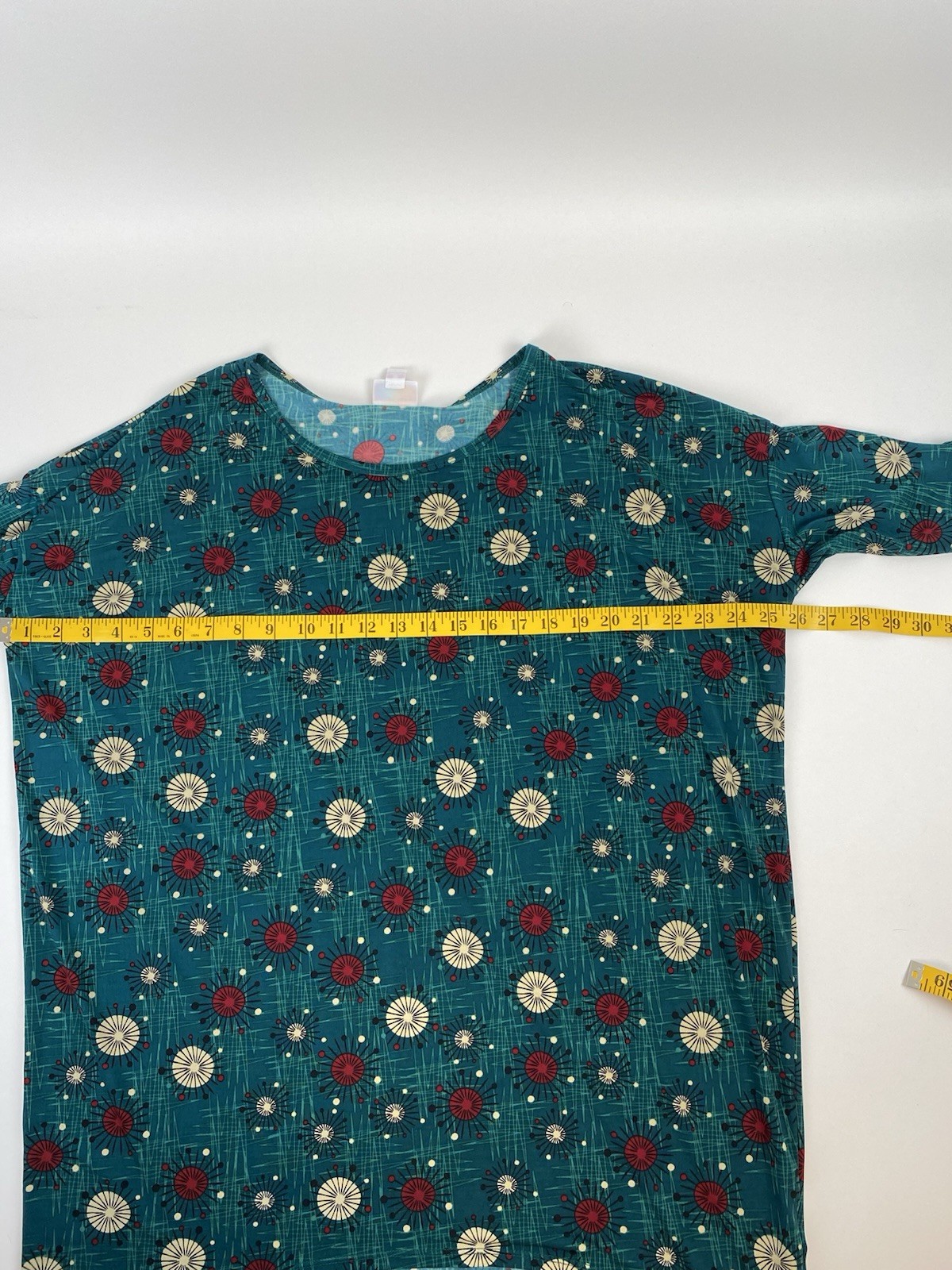 LulaRoe women’s stretch short sleeve green top hi-low measures 3X (see pictures)