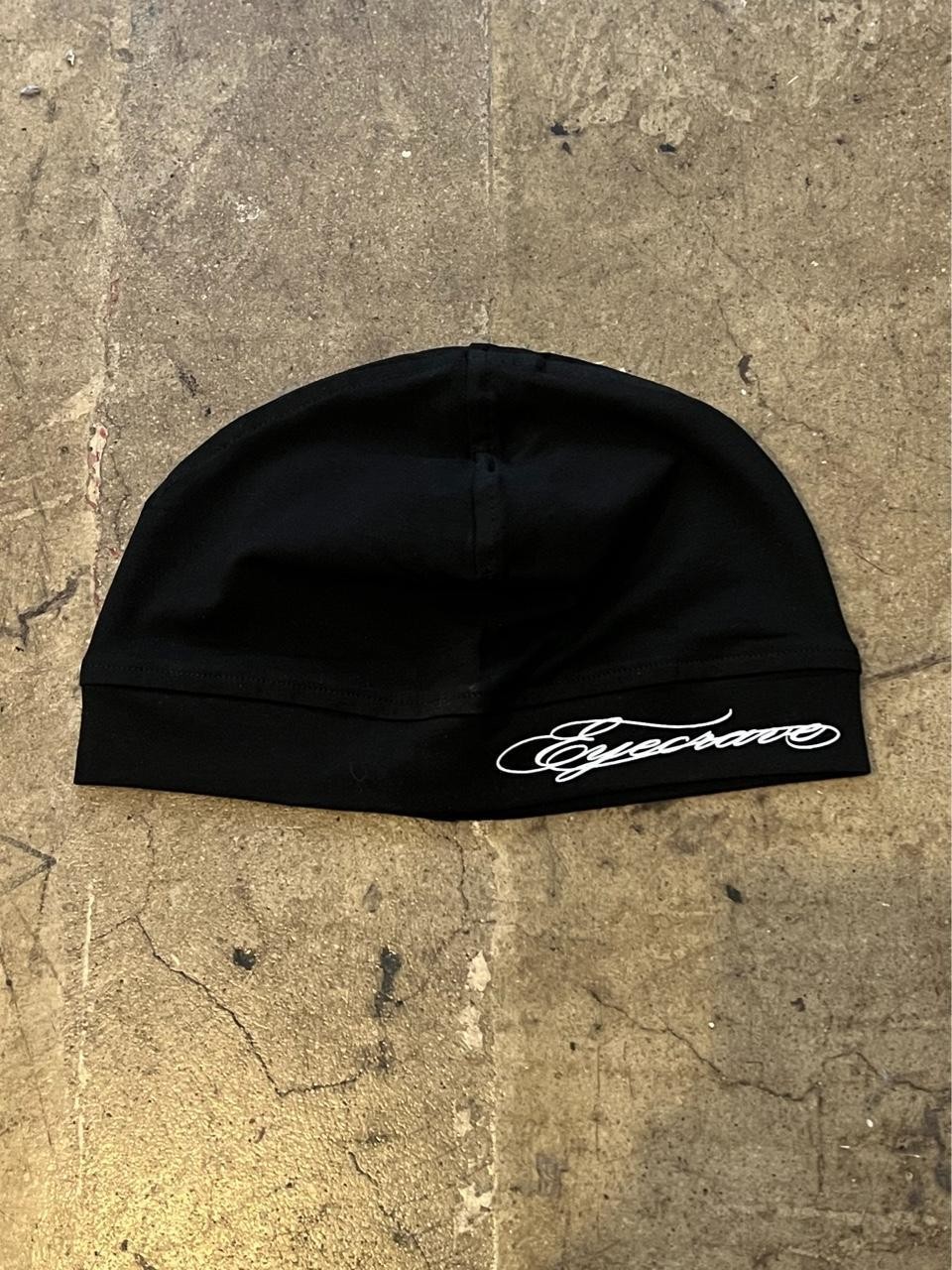 Black eyecrave skull cap beanie